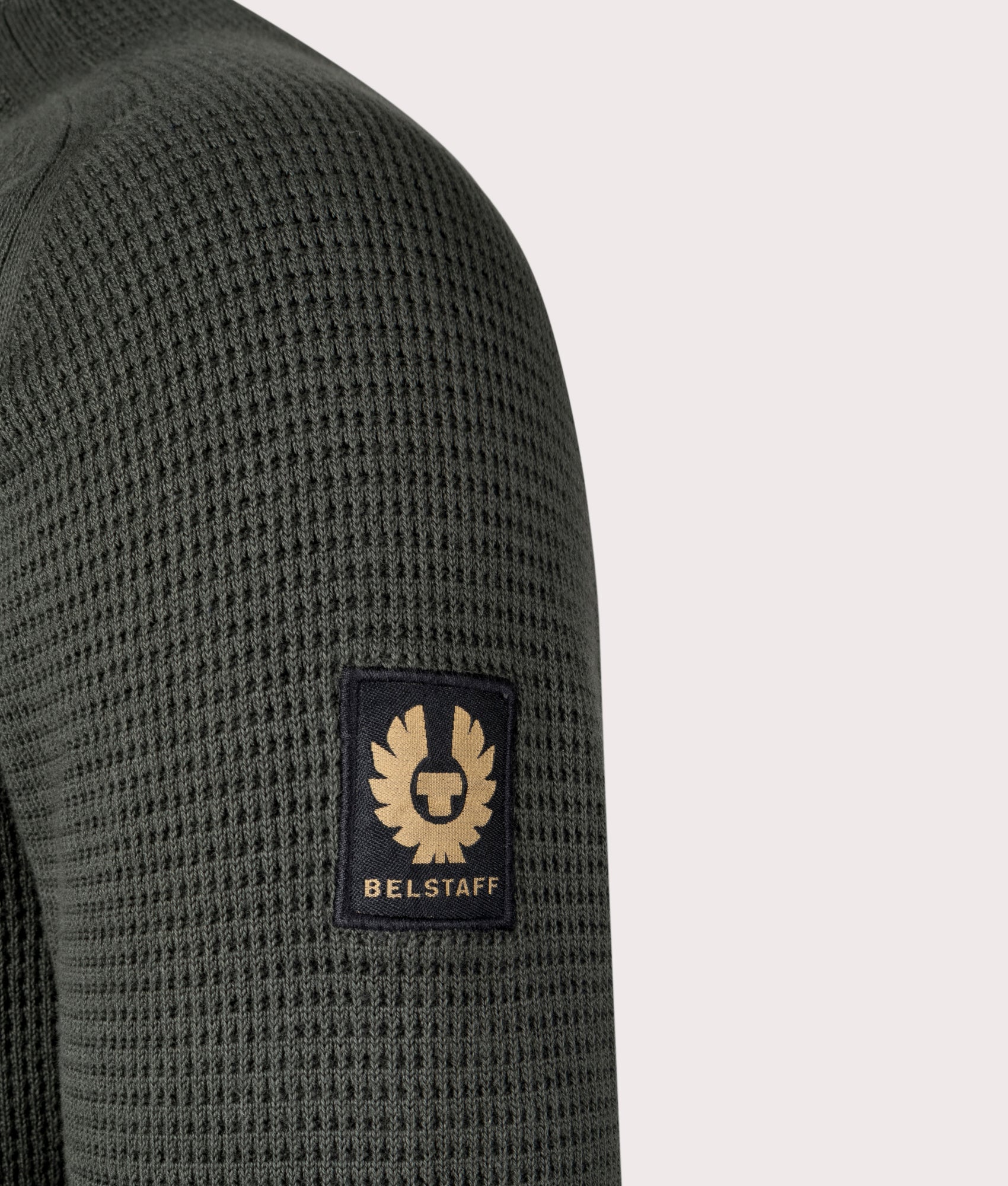 Belstaff Cole Quarter Zip Jumper in Tile Green. Detail angle shot at EQVVS.