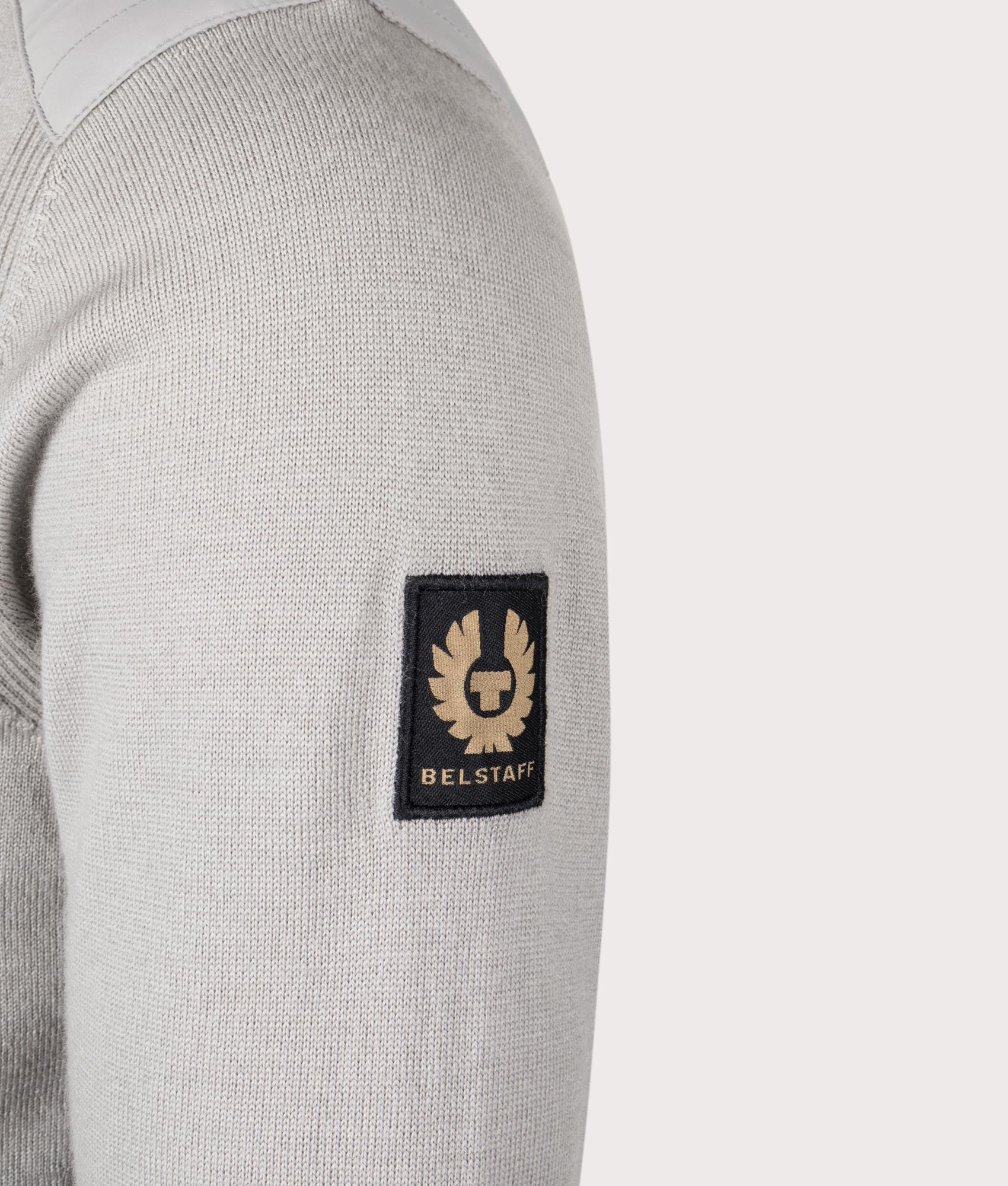 Belstaff Kilmington Quarter Zip Jumper in Chrome Grey. Detail angle shot at EQVVS.