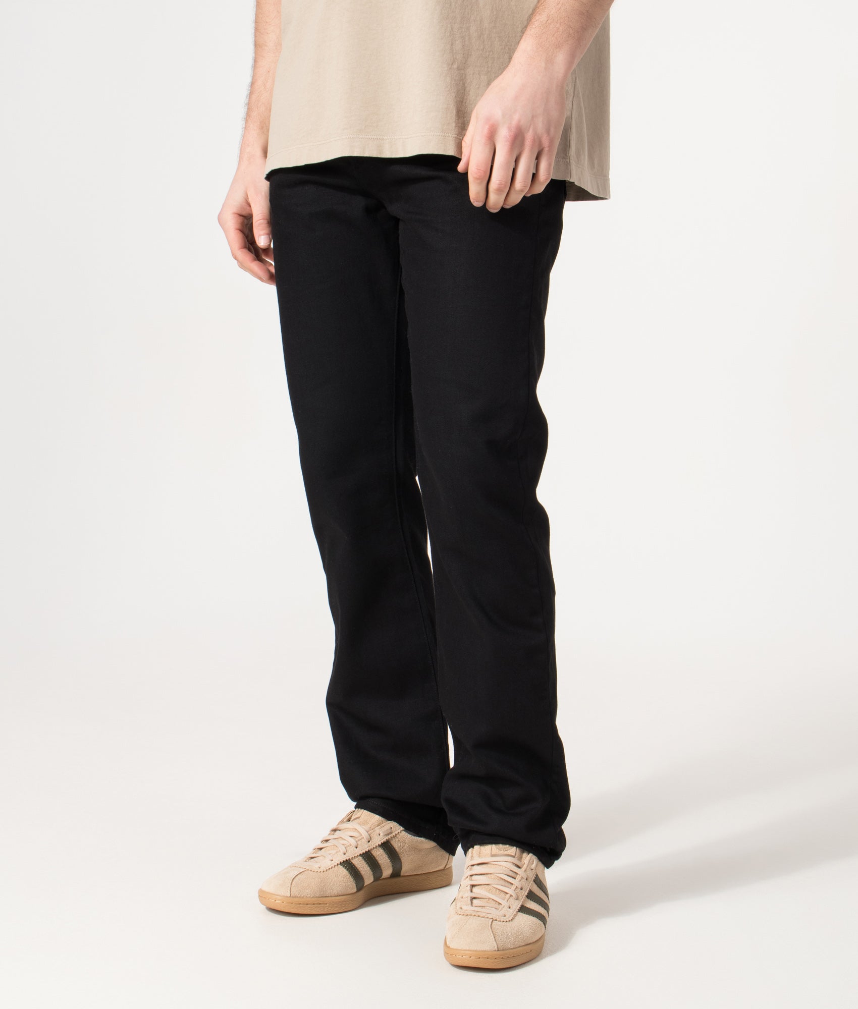 Belstaff Regular Fit Longton Jeans in Black at EQVVS Menswear. Angled model front shot.