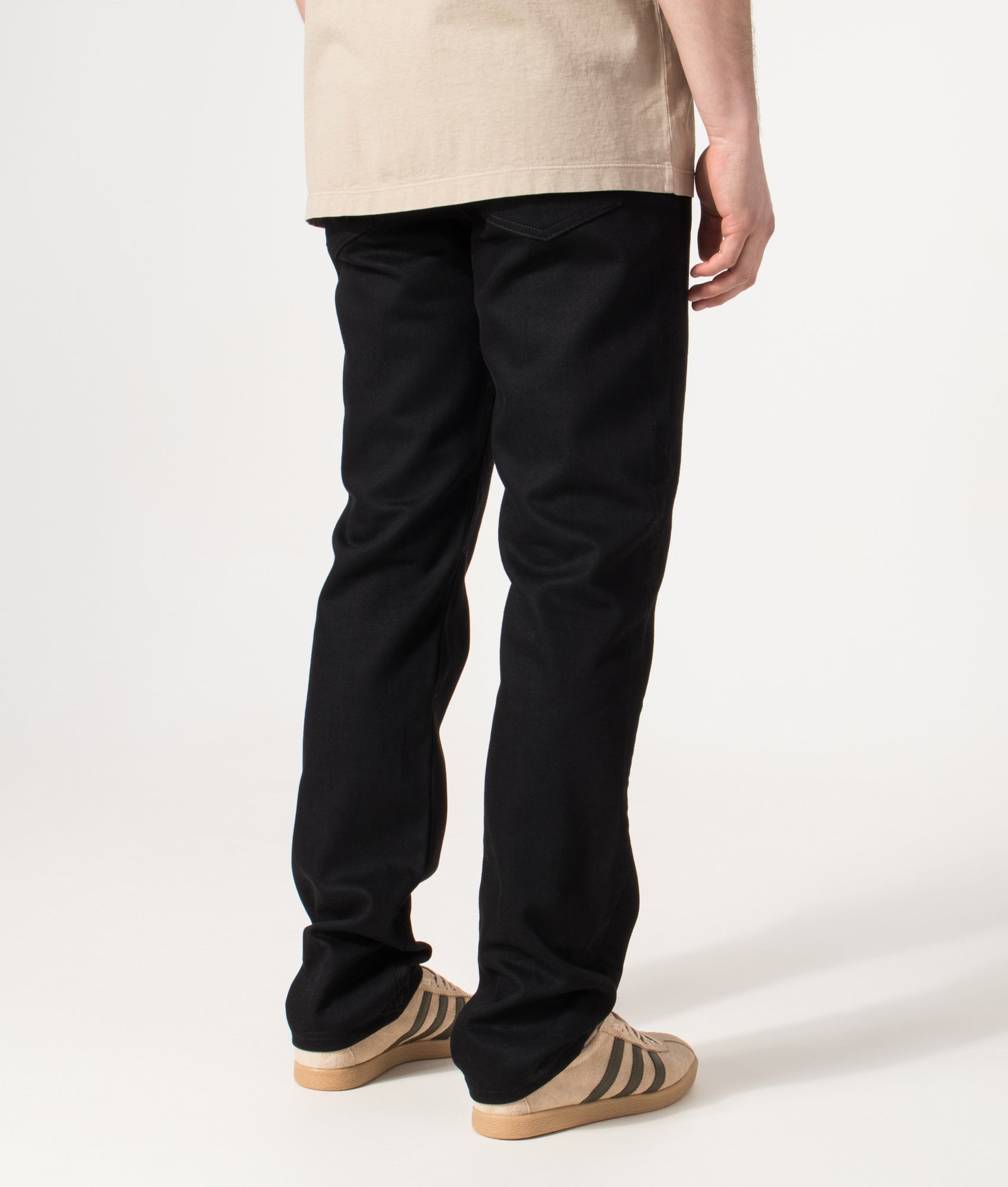 Belstaff Regular Fit Longton Jeans in Black at EQVVS Menswear. Model back shot.