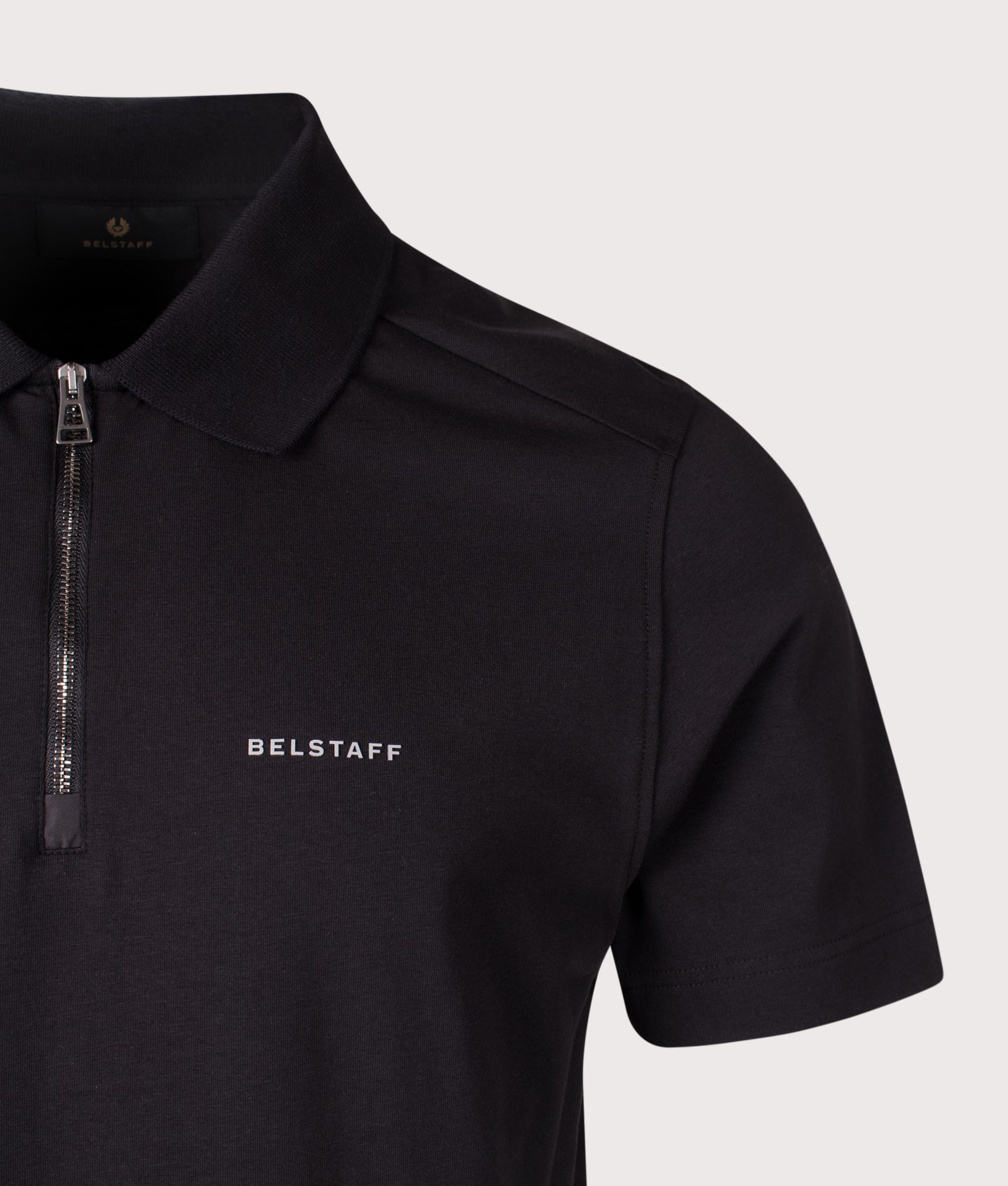 Belstaff Alloy Polo Shirt in Black at EQVVS Menswear. Detail shot.