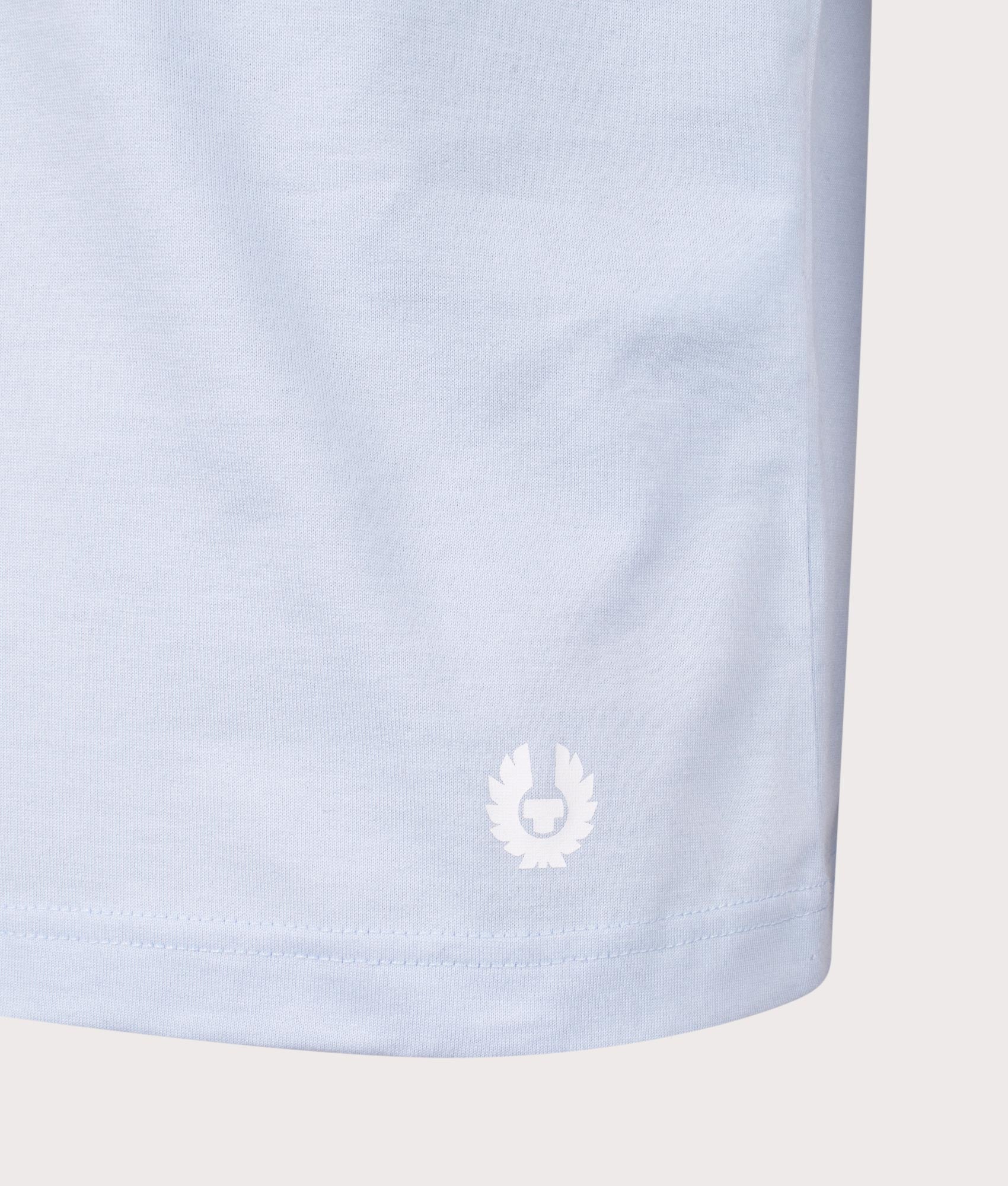 Belstaff Staple Logo T-Shirt in Sky Blue, 100% Cotton at EQVVS. Detailed logo shot. 