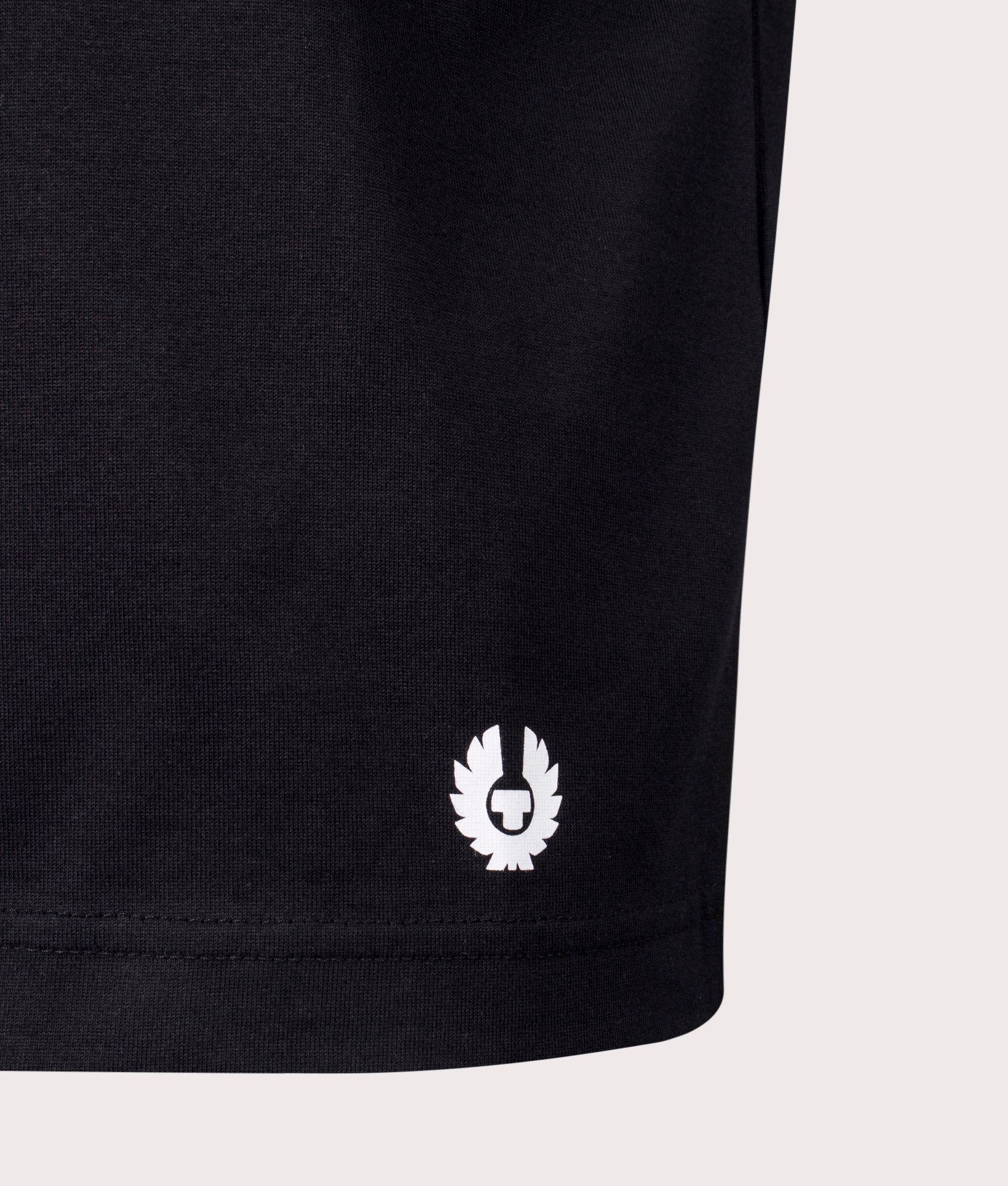 Belstaff Staple Logo T-Shirt in Black, 100% cotton at EQVVS. Detailed logo shot. 