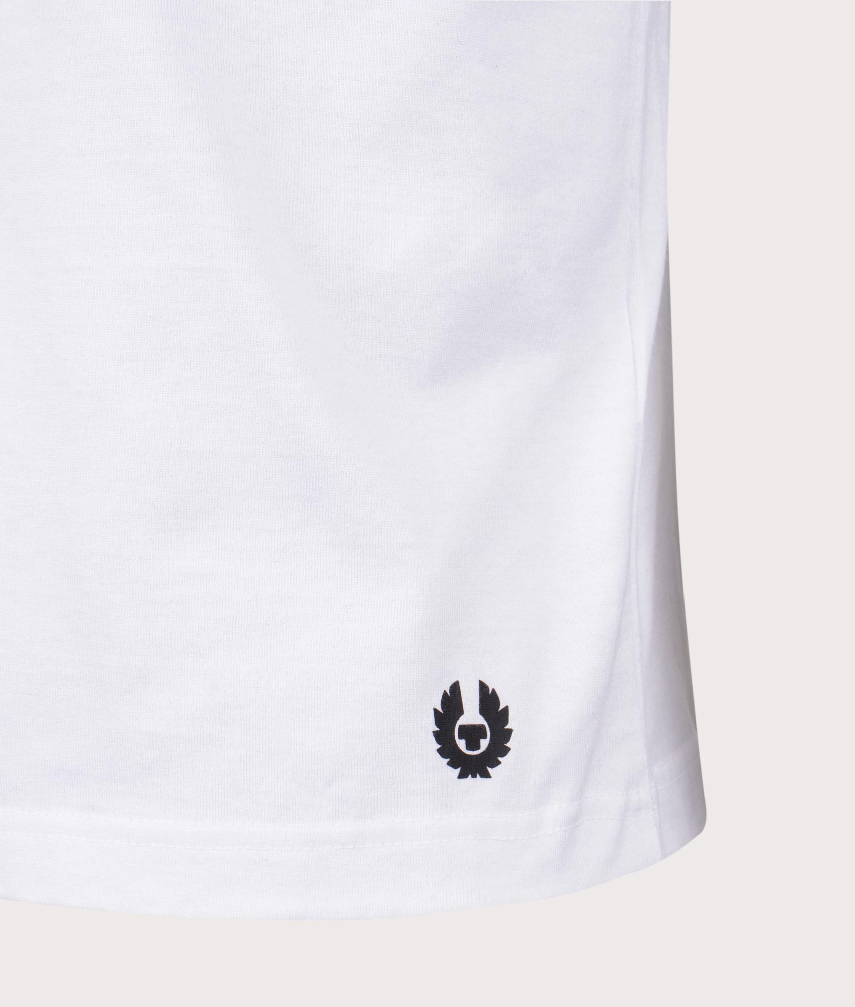 Belstaff Staple Logo T-Shirt in White, 100% Cotton at EQVVS. Detailed logo shot. 