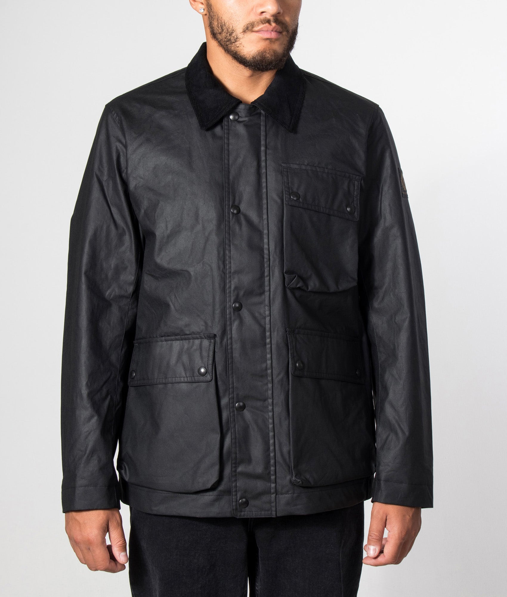 Belstaff Regular fit Incline Jacket in Black at EQVVS Menswear. Model front shot.