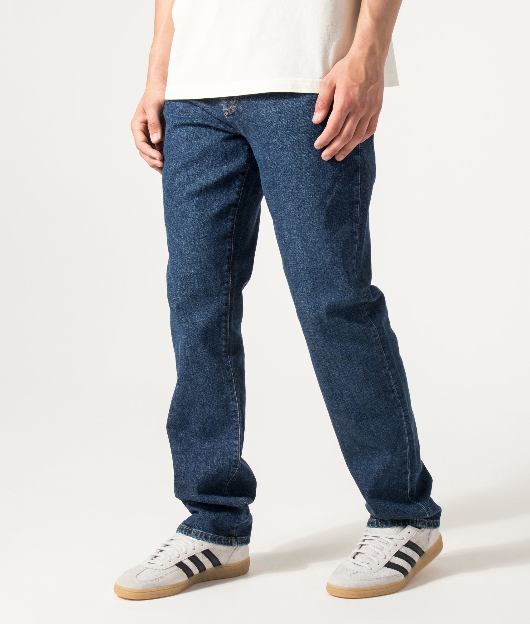 Belstaff Regular Fit B69 Jeans in Washed Indigo at EQVVS Menswear. Angled front shot.