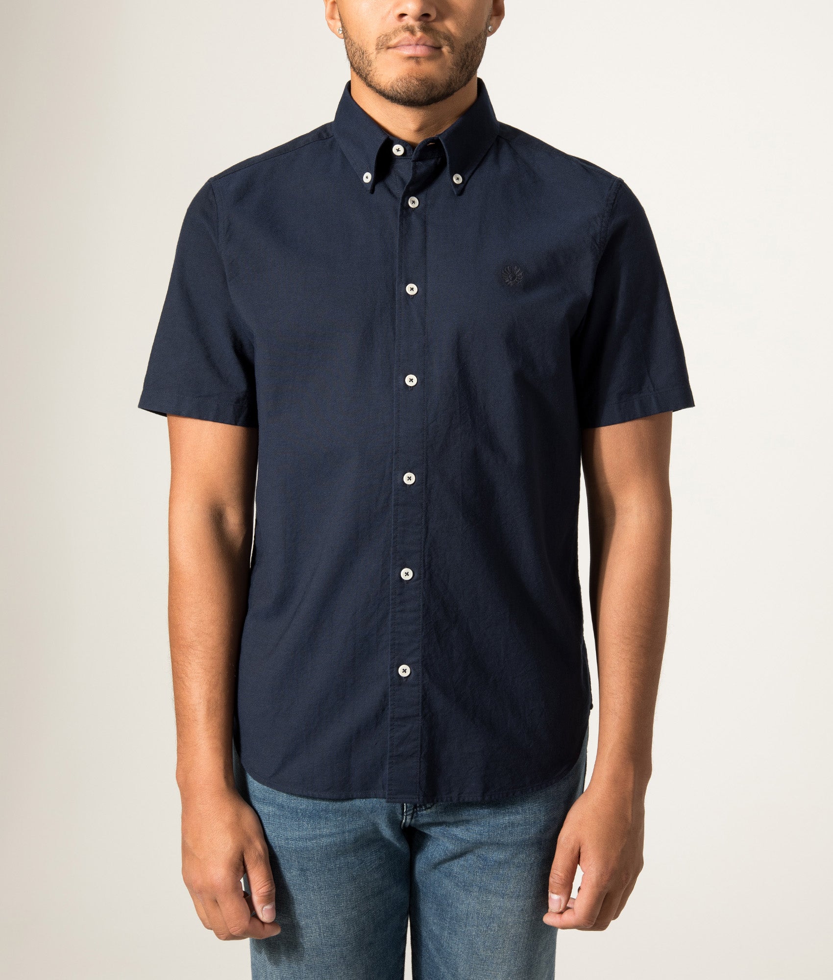 Belstaff Slim Fit Short Sleeve Street Shirt in Dark Ink at EQVVS Menswear. Model front shot.