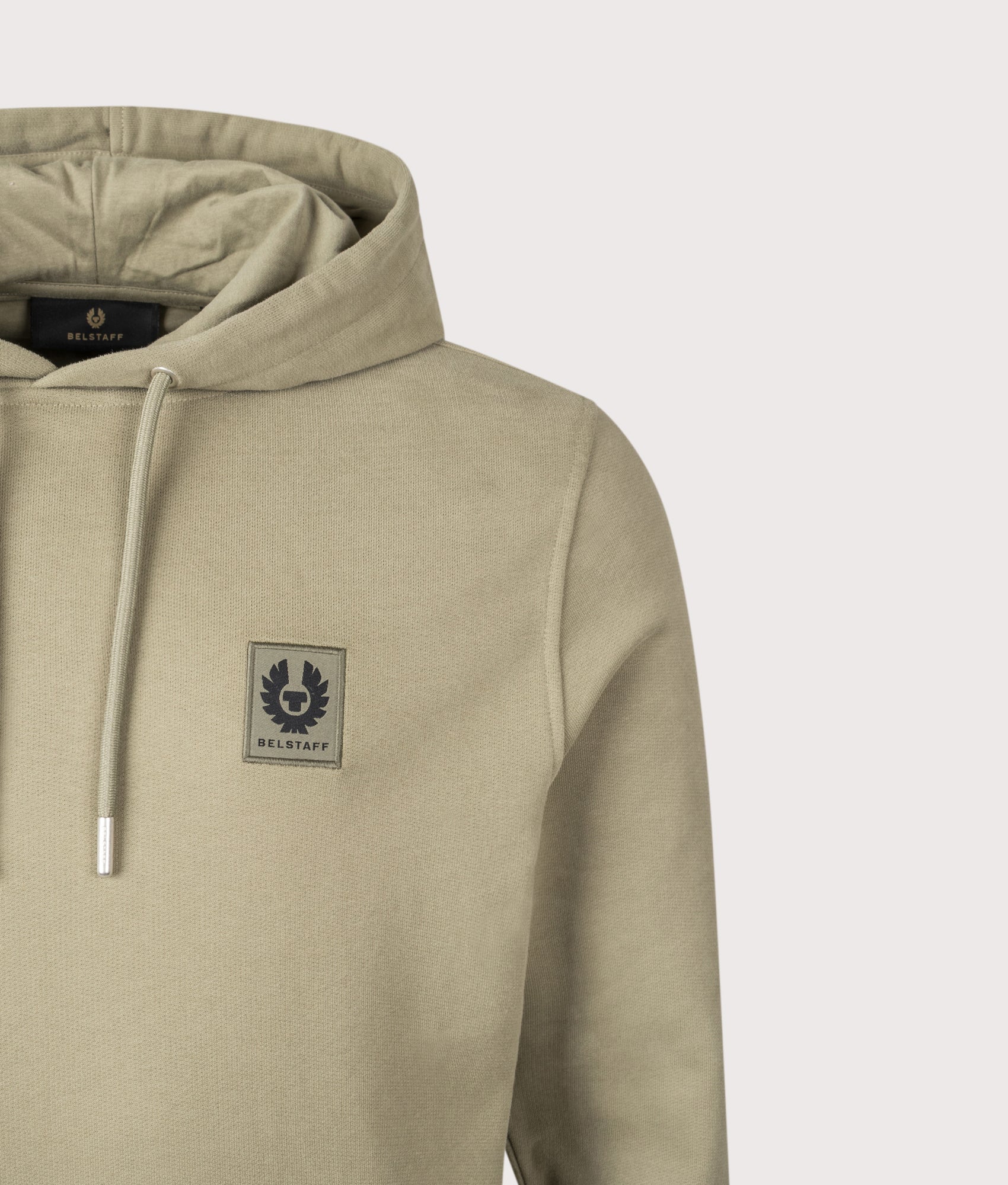 Belstaff Hoodie in Fatigue Green at EQVVS Menswear. Detail shot.