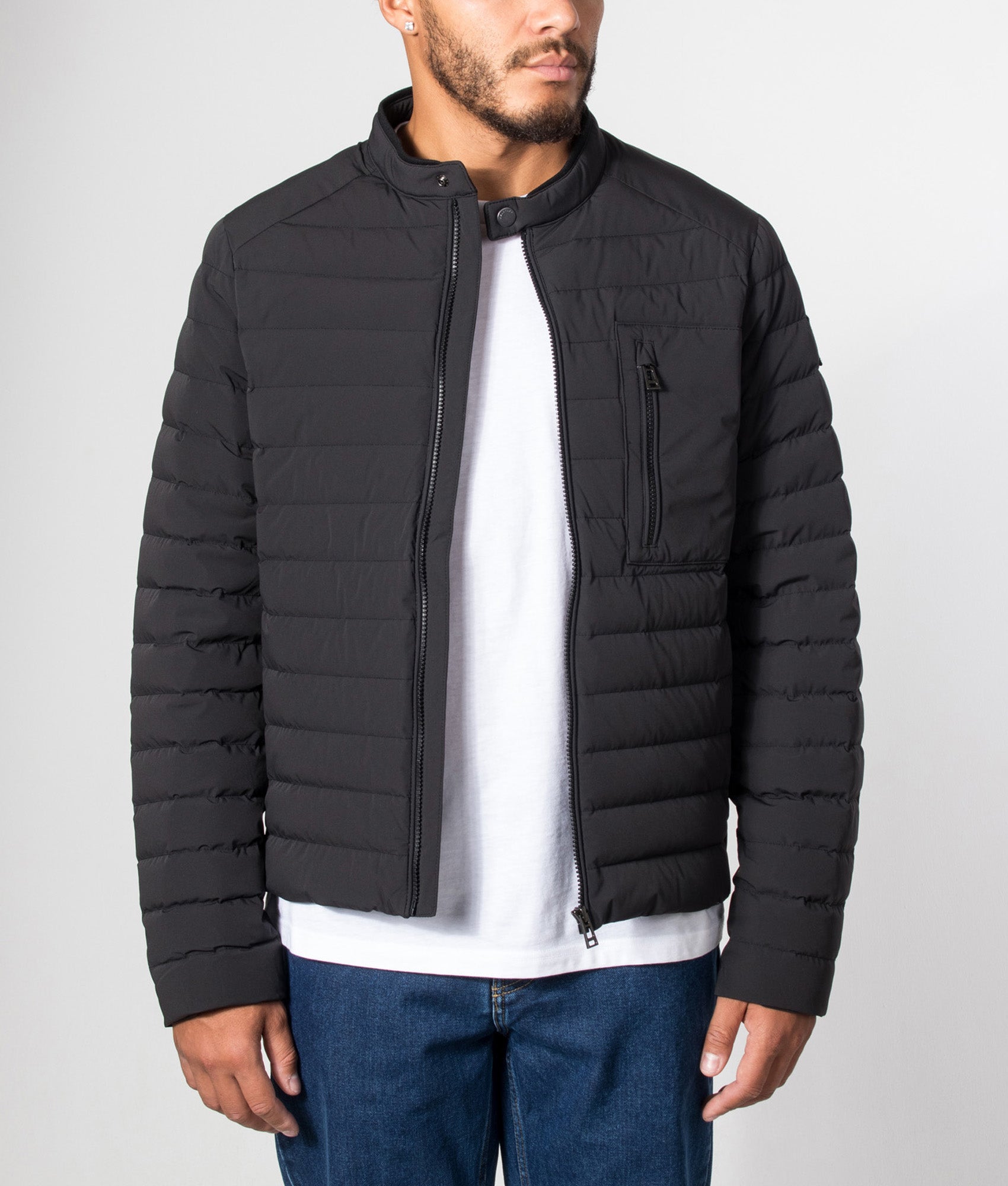 Belstaff Regular Fit Chassis Jacket in Black at EQVVS Menswear. Model front shot.