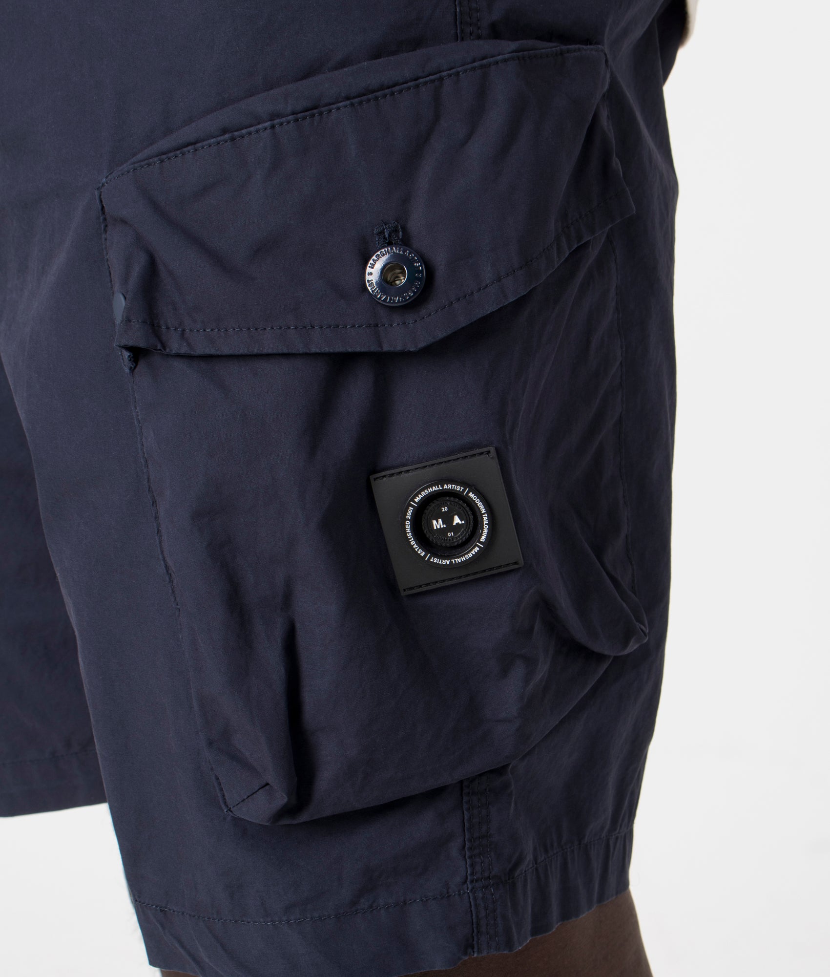 Marshall Artist Storma Cargo Shorts in Navy. Detail shot at EQVVS. 