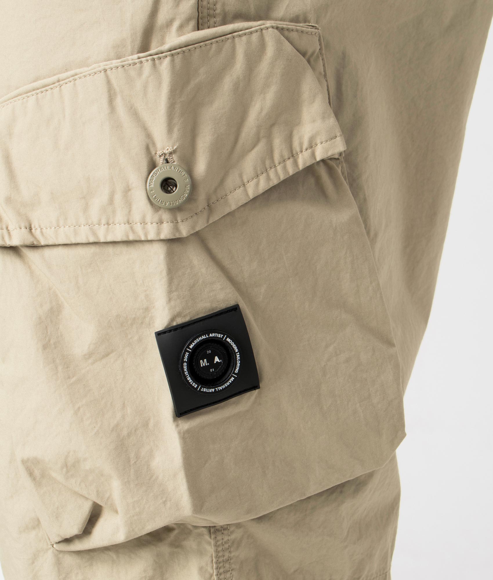 Marshall artist Storma Cargo Shorts in 010 sandstone with siren detail siren detail shot at EQVVS