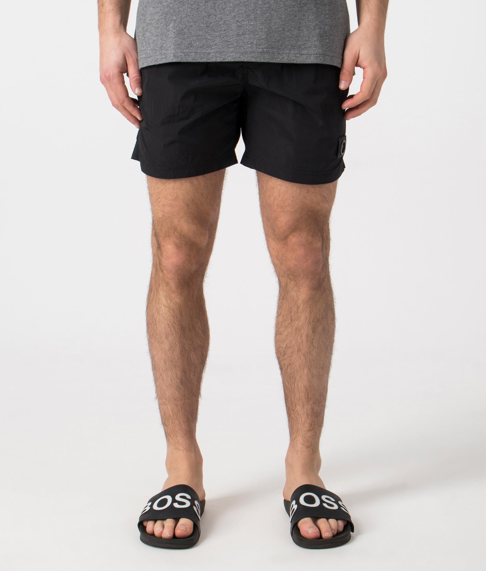 Marshall Artist Krinkle Nylon Siren Swim Shorts in Black. Front angle shot at EQVVS.