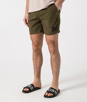 Marshall Artist Krinkle Nylon Siren Swim Shorts in Khaki. Side angle shot at EQVVS.