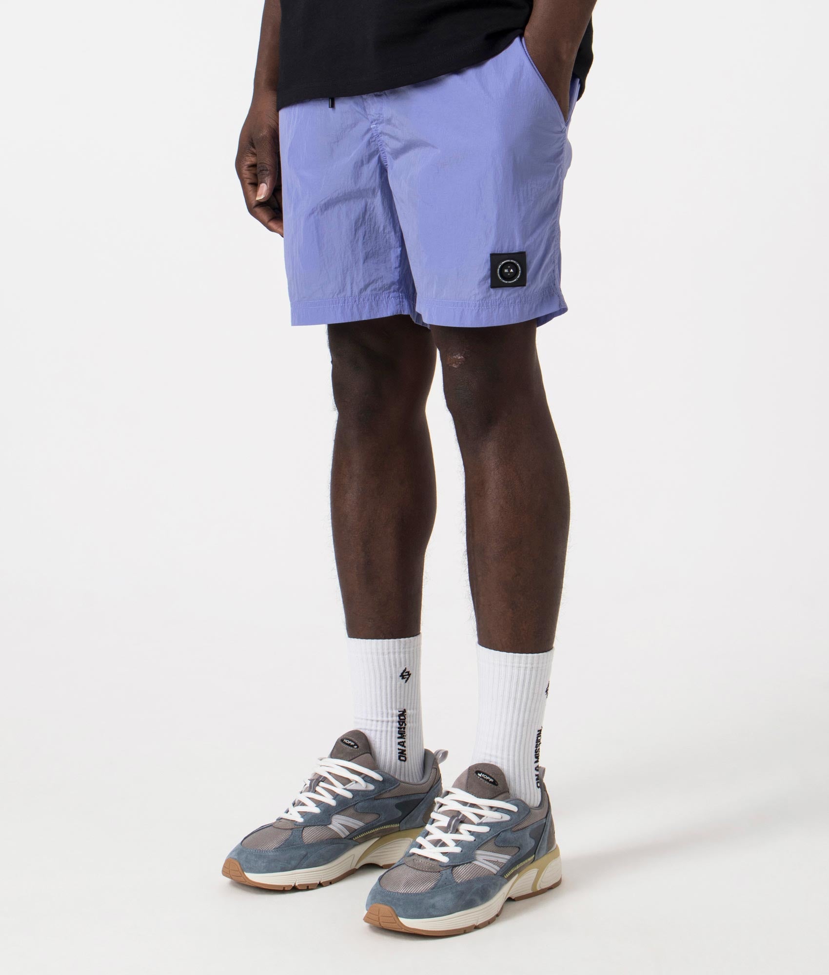 Marshall Artist Krinkle Nylon Siren Swim Shorts in Ultra Violet. Side angle shot at EQVVS.