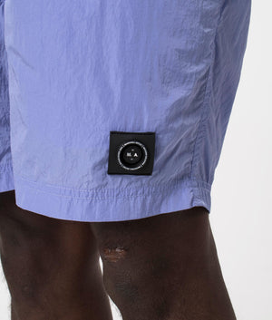 Marshall Artist Krinkle Nylon Siren Swim Shorts in Ultra Violet. Detail shot at EQVVS.