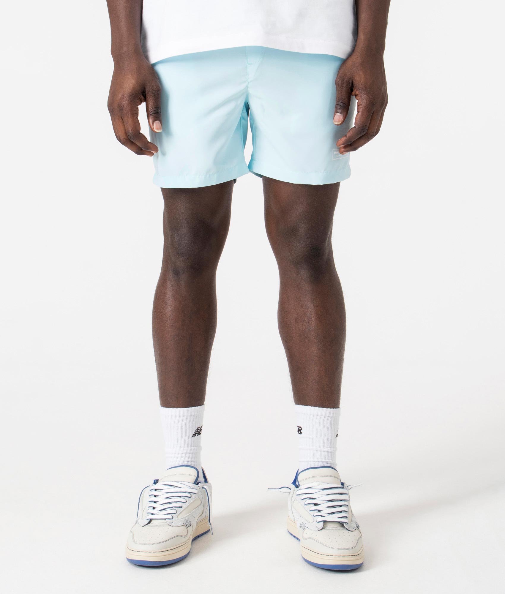 Signature Swim Shorts in Sky Blue by Marshall Artist. EQVVS Front Angle Shot.