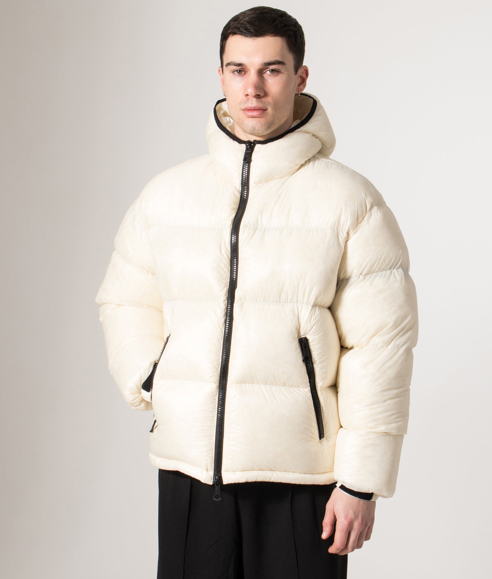 MKI MIYUKI ZOKU Translucent Bubble Jacket in Off White at EQVVS Menswear. Front model shot.