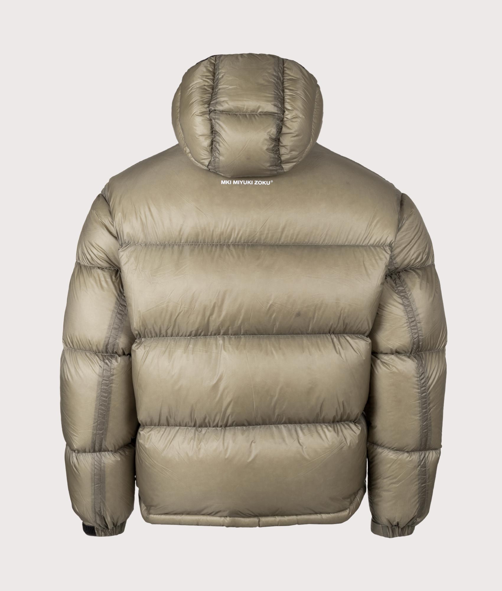 MKI MIYUKI ZOKU Translucent Bubble Jacket in Sage at EQVVS Menswear. Back shot. 
