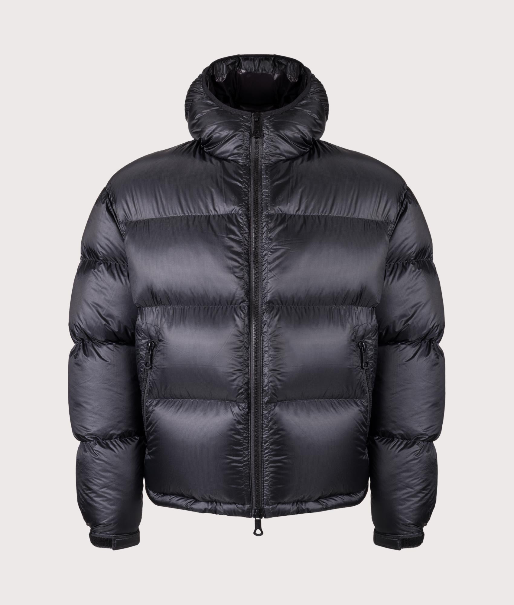 MKI MIYUKI ZOKU Translucent Hooded Bubble jacket in Black at EQVVS Menswear. Front shot.
