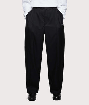 MKI MIYUKI ZOKU V2 Wide Leg Suit Pants in black at EQVVS Menswear. Model front shot.