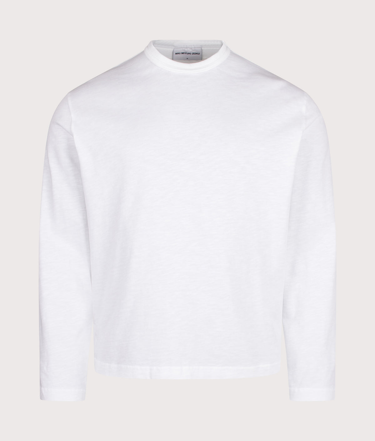 MKI MIYUKI ZOKU Relaxed Fit 220 GSM Slub Long Sleeve T-Shirt in White at EQVVS Menswear. Front shot.