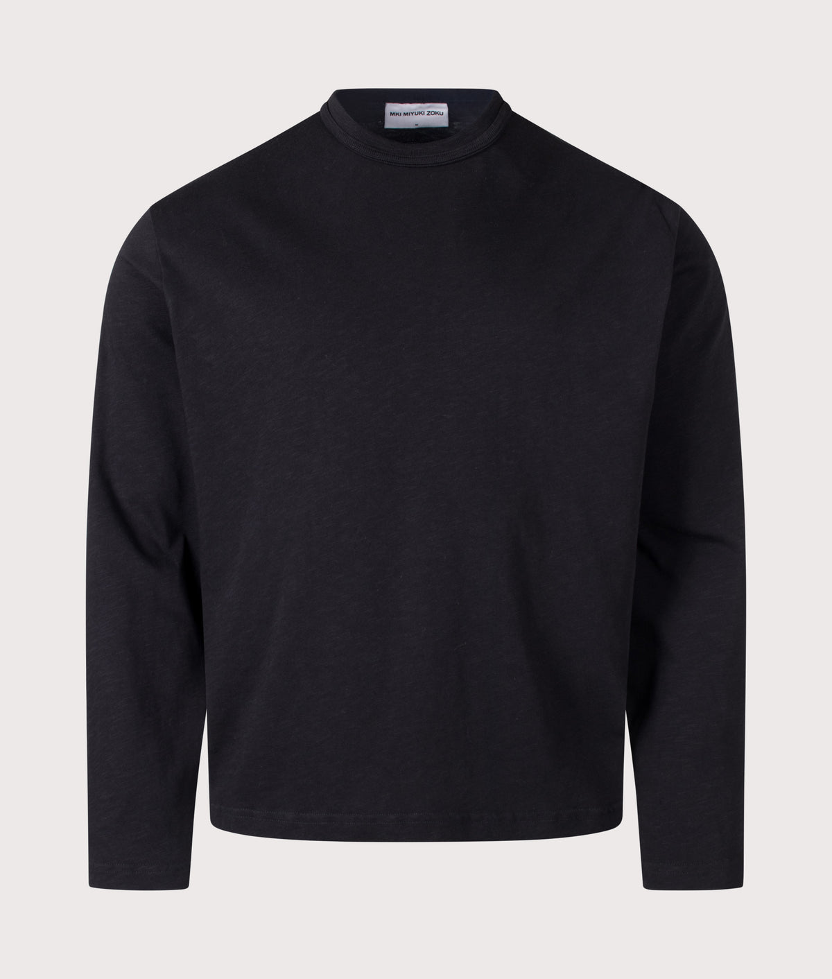 MKI MIYUKI ZOKU Relaxed Fit 220 GSM Slub Long Sleeve T-Shirt in Black at EQVVS Menswear. Front shot.