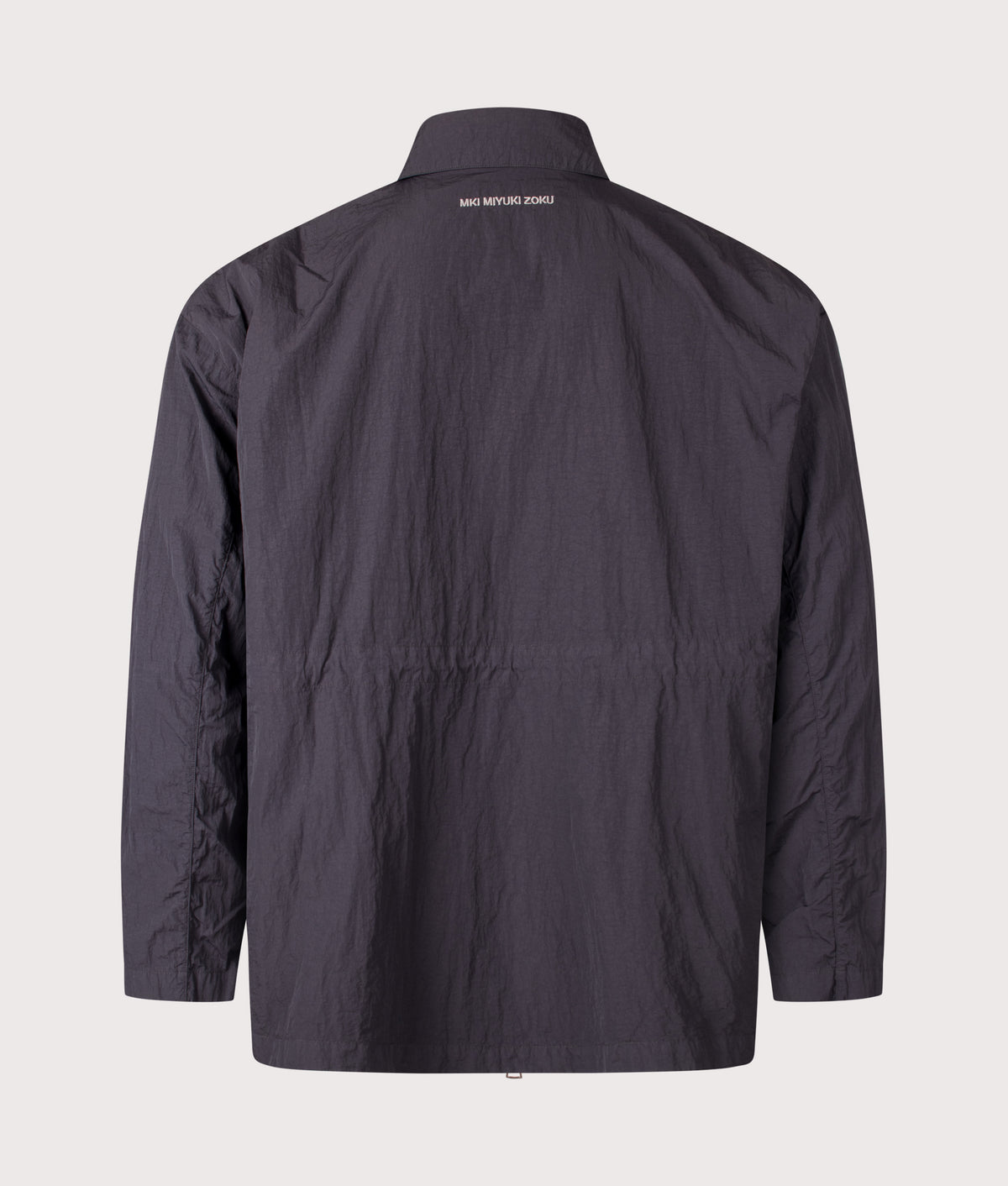 MKI MIYUKI ZOKU Relaxed Fit Garment Dyed Field Overshirt in Vintage Black at EQVVS Menswear. Back shot.