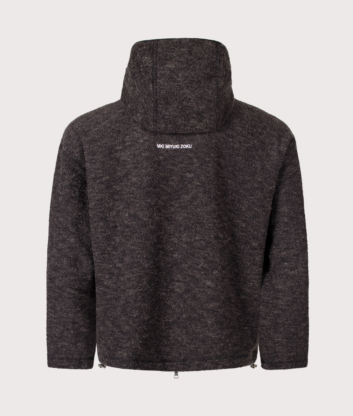 MKI MIYUKI ZOKU Relaxed Box Fit Boucle Zip Through Hoodie in Charcoal Melange at EQVVS Menswear. Back shot.