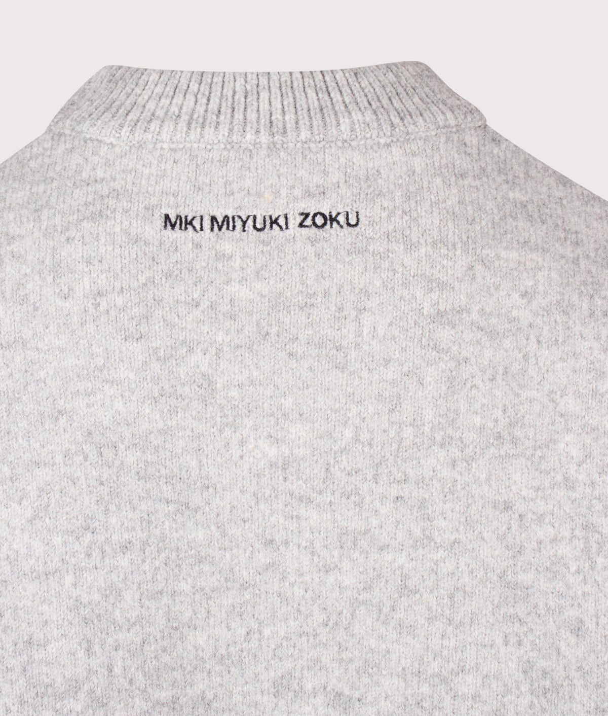 MKI MIYUKI ZOKU Relaxed Box Fit Double Knit Crewneck Jumper in Ash at EQVVS Menswear. Detail shot.