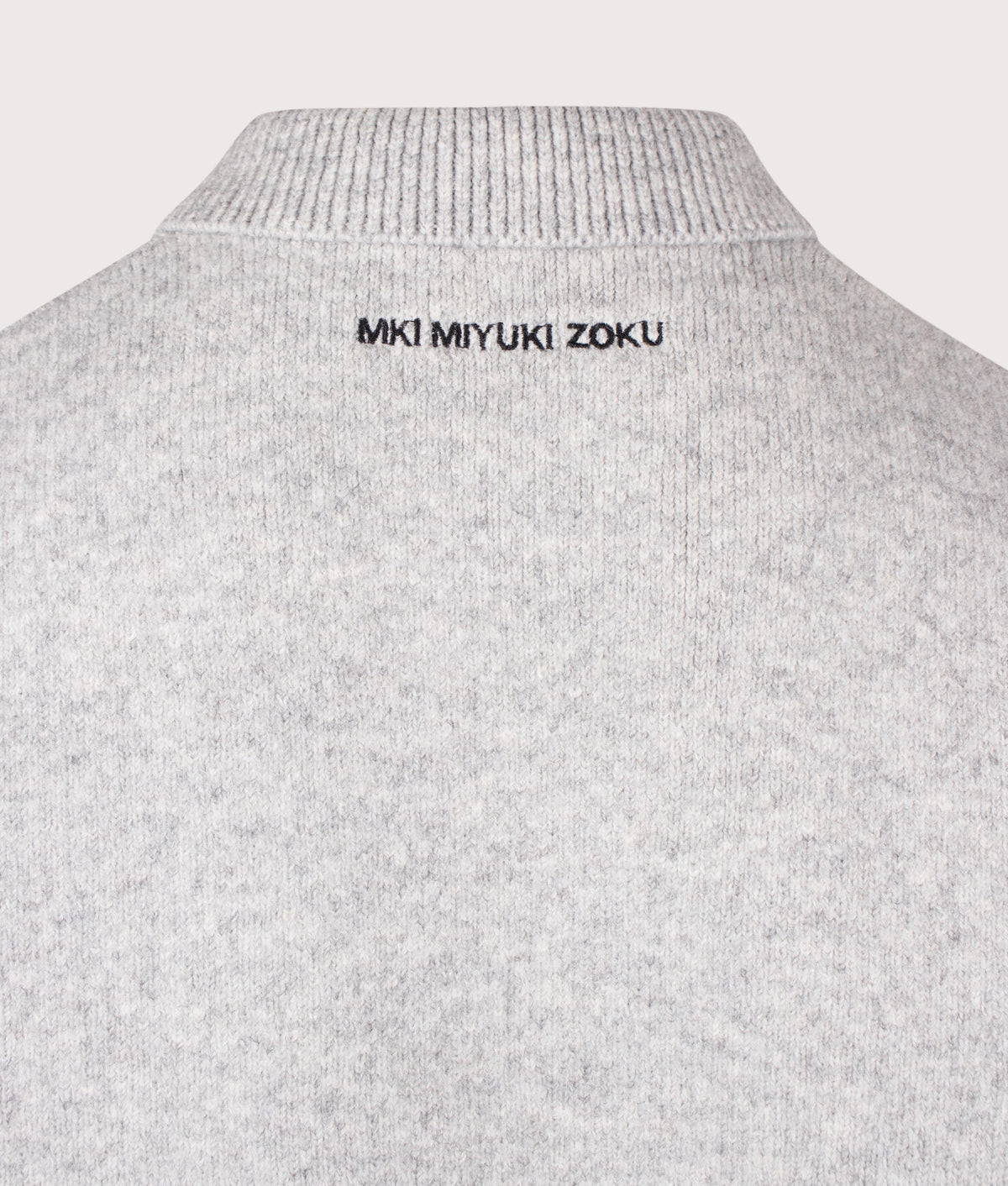 MKI MIYUKI ZOKU Relaxed Box Fit Double Knit Rugby Crewneck Jumper in Ash at EQVVS Menswear. Detail shot.