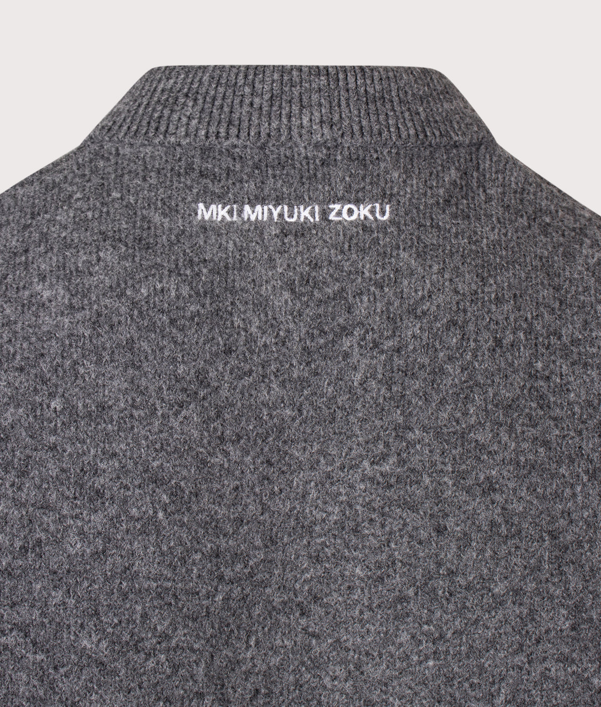 MKI MIYUKI ZOKU Relaxed Box Fit Double Knit Rugby in Charcoal at EQVVS Menswear. Detail shot.