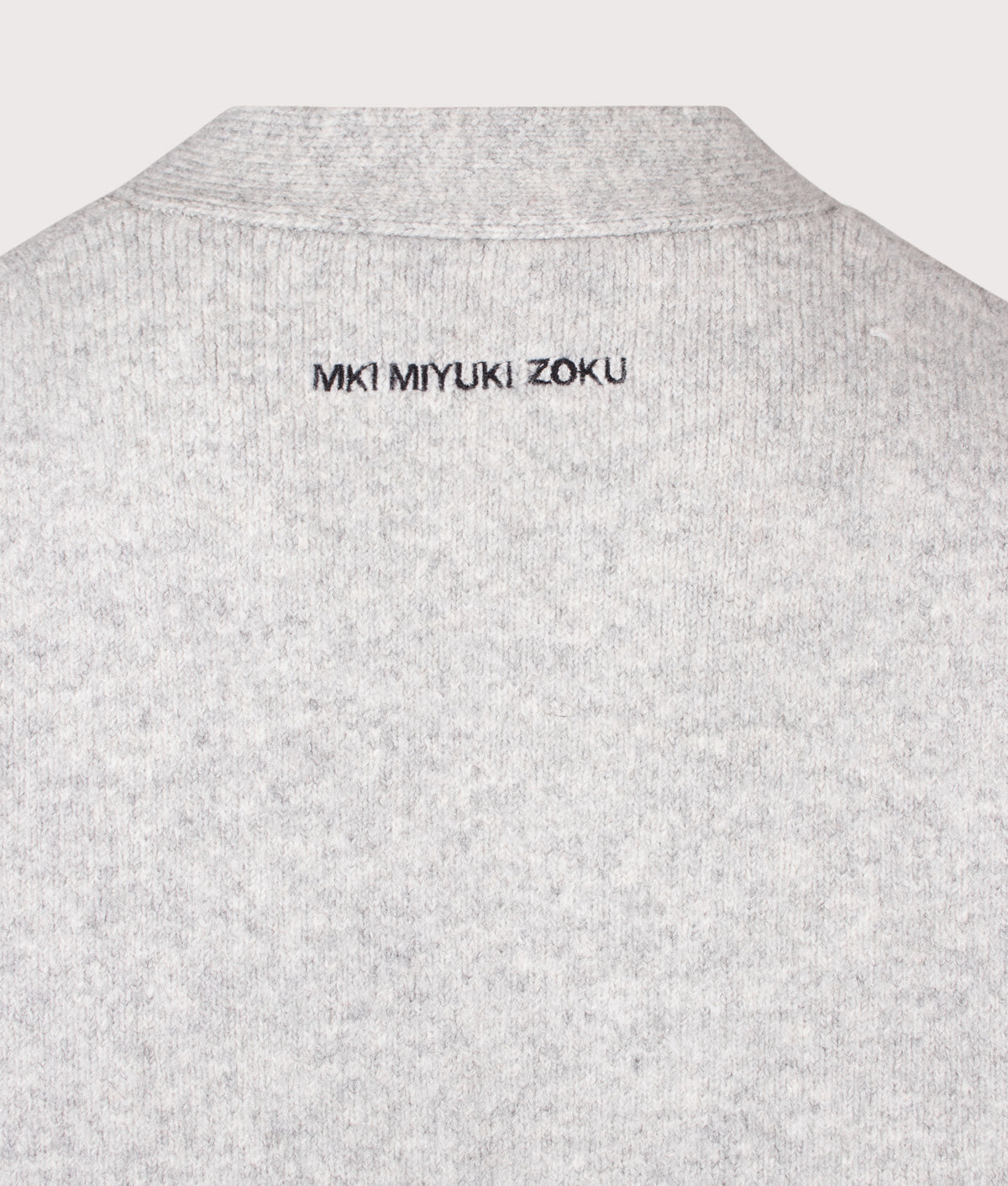 MKI MIYUKI ZOKU Relaxed Box Fit Double Knit Cardigan in Ash at EQVVS Menswear. Detail shot.