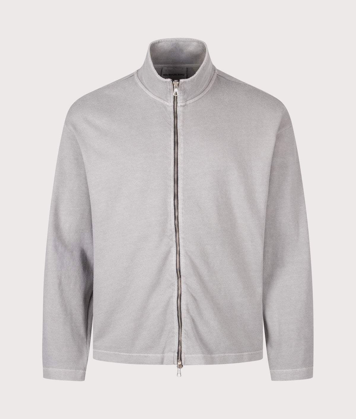 MKI MIYUKI ZOKU Relaxed Fit 400 GSM Pigment Dyed Track Jacket in Pigment Stone at EQVVS Menswear. Front shot.