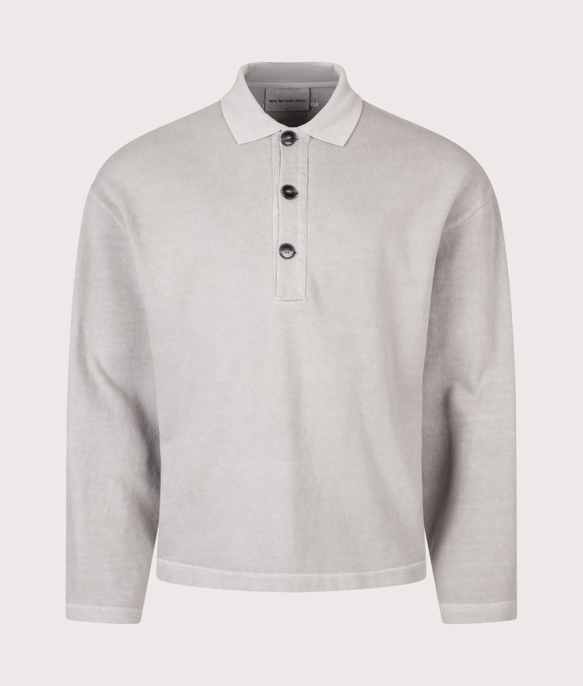 MKI MIYUKI ZOKU Relaxed Box Fit 400 GSM Pigment Dyed Rugby Shirt in Pigment Stone at EQVVS Menswear. Front shot.