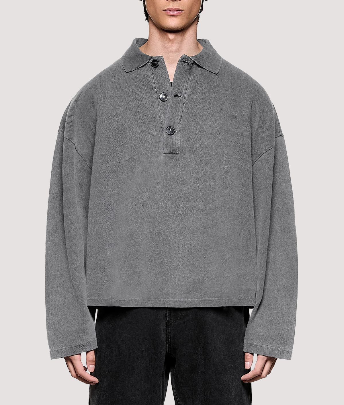 MKI MIYUKI ZOKU Relaxed Box Fit 400 GSM Pigment Dyed Rugby Shirt in Pigment Black at EQVVS Menswear. Front shot.