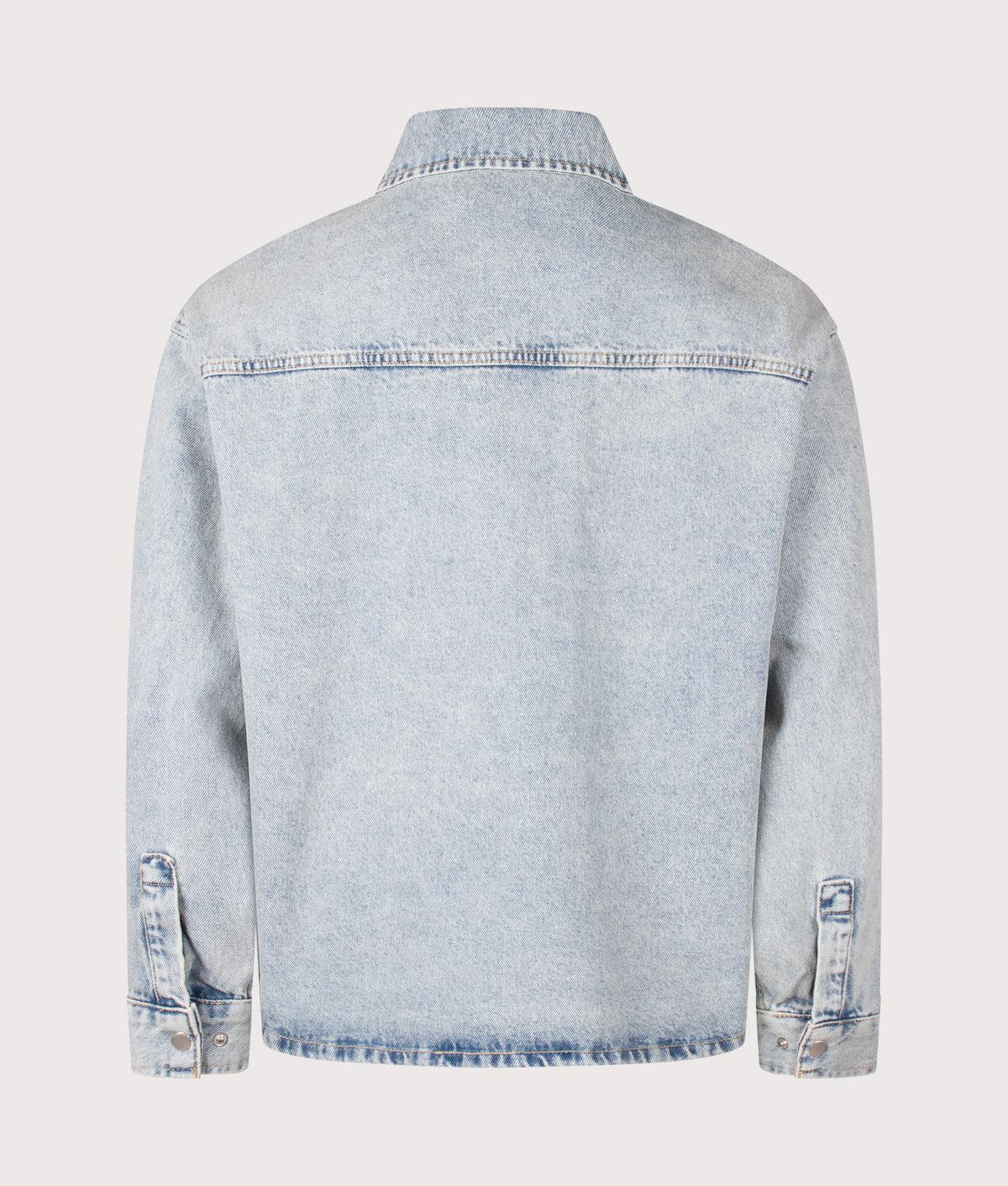 MKI MIYUKI ZOKU Relaxed Box Fit Denim Box Overshirt in Bleach Wash at EQVVS Menswear. Back shot.