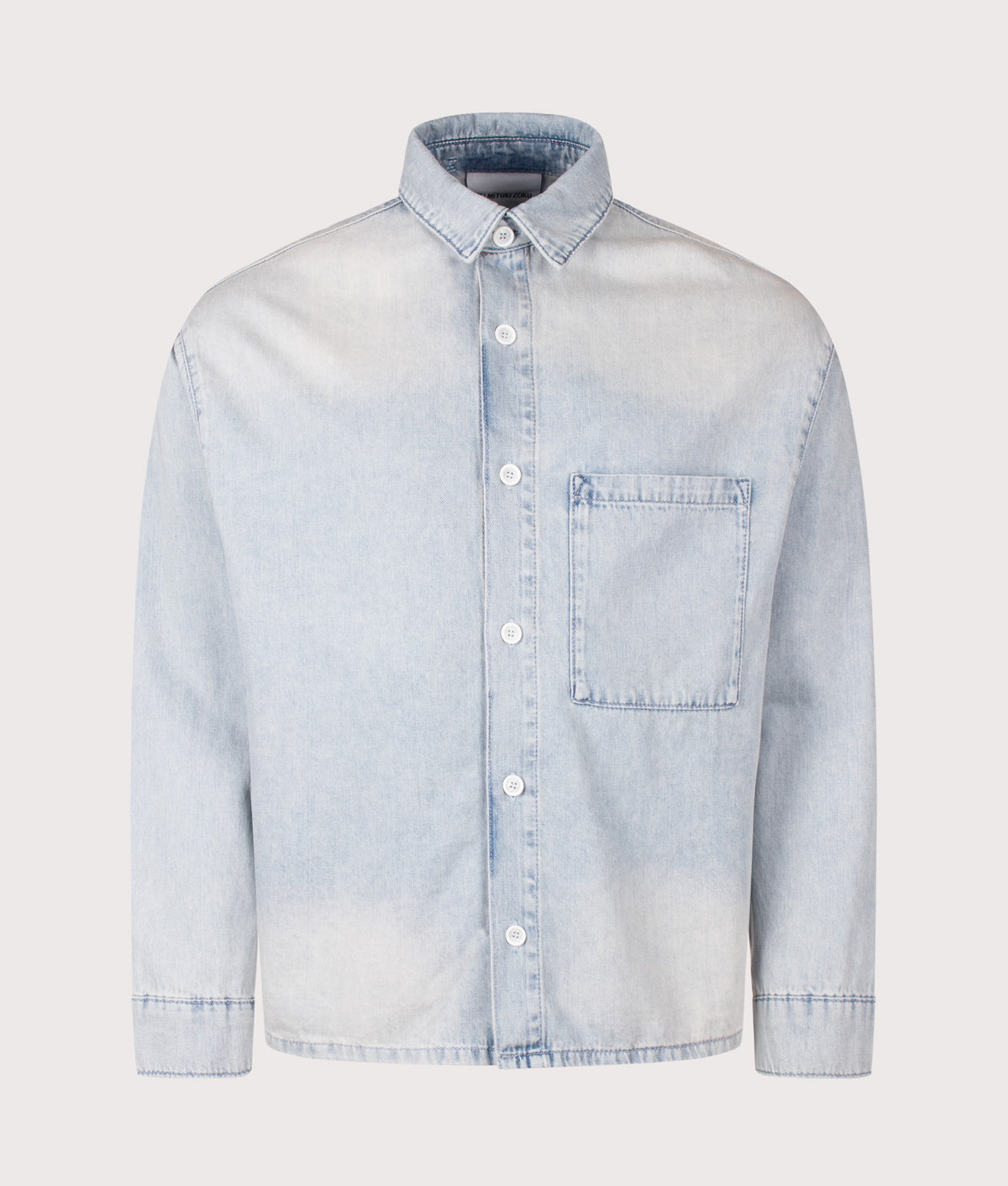MKI MIYUKI ZOKU Relaxed Box Fit Dress Shirt in Sunfaded Denim at EQVVS Menswear. Front shot.