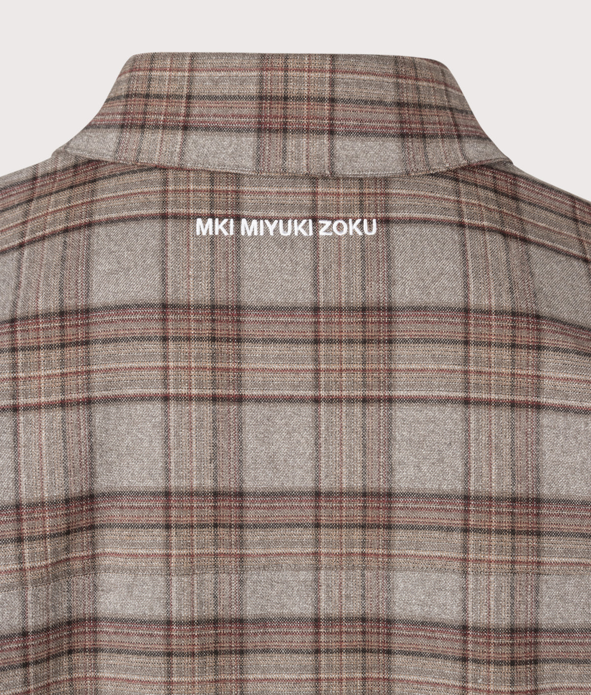 MKI MIYUKI ZOKU Relaxed Box Fit Dress Shirt in Brown check at EQVVS Menswear. Detail shot.