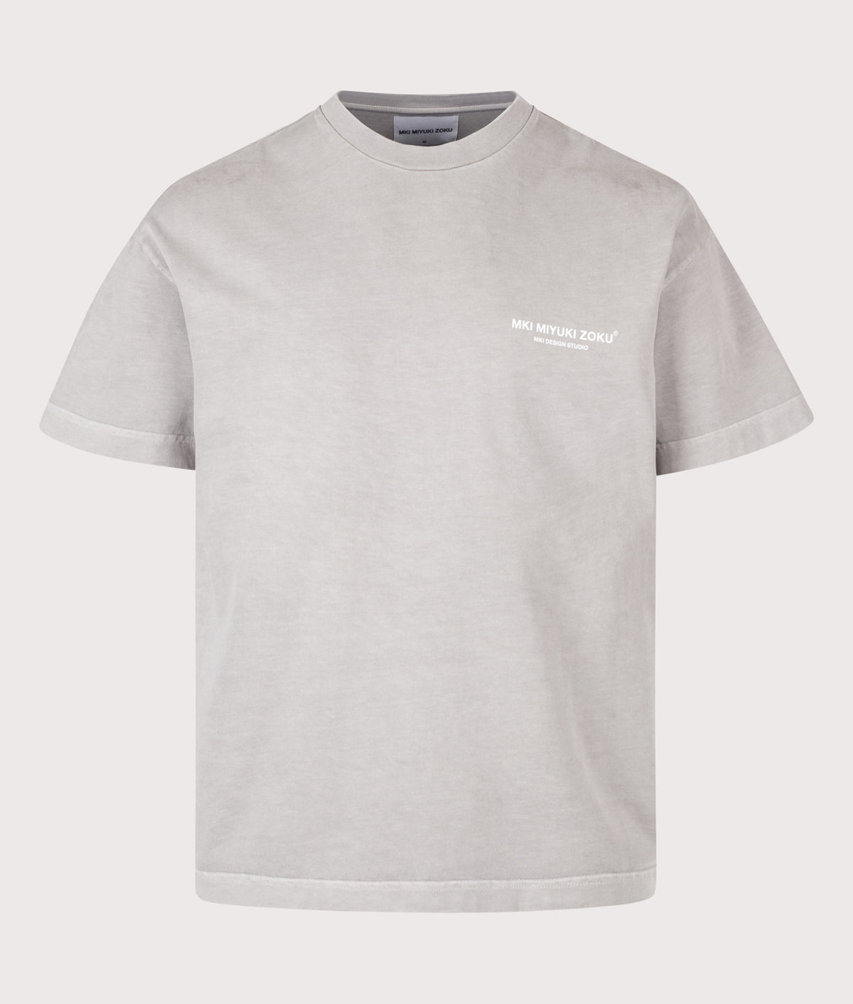 MKI MIYUKI ZOKU Oversized Box Fit Design Studio T-Shirt in Pigment Stone at EQVVS Menswear. Front shot.