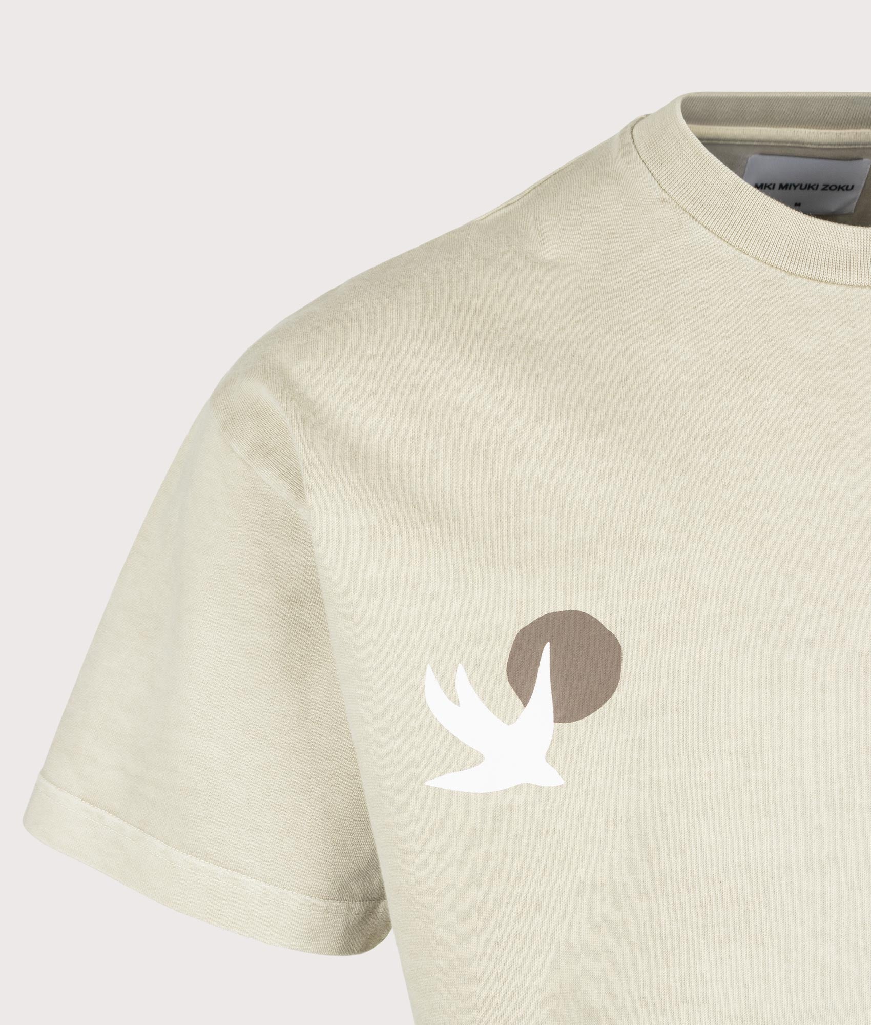 MKI MIYUKI ZOKU Oversized Swallow T-Shirt in Pigment Cement at EQVVS Menswear. Detail Swallow shot.