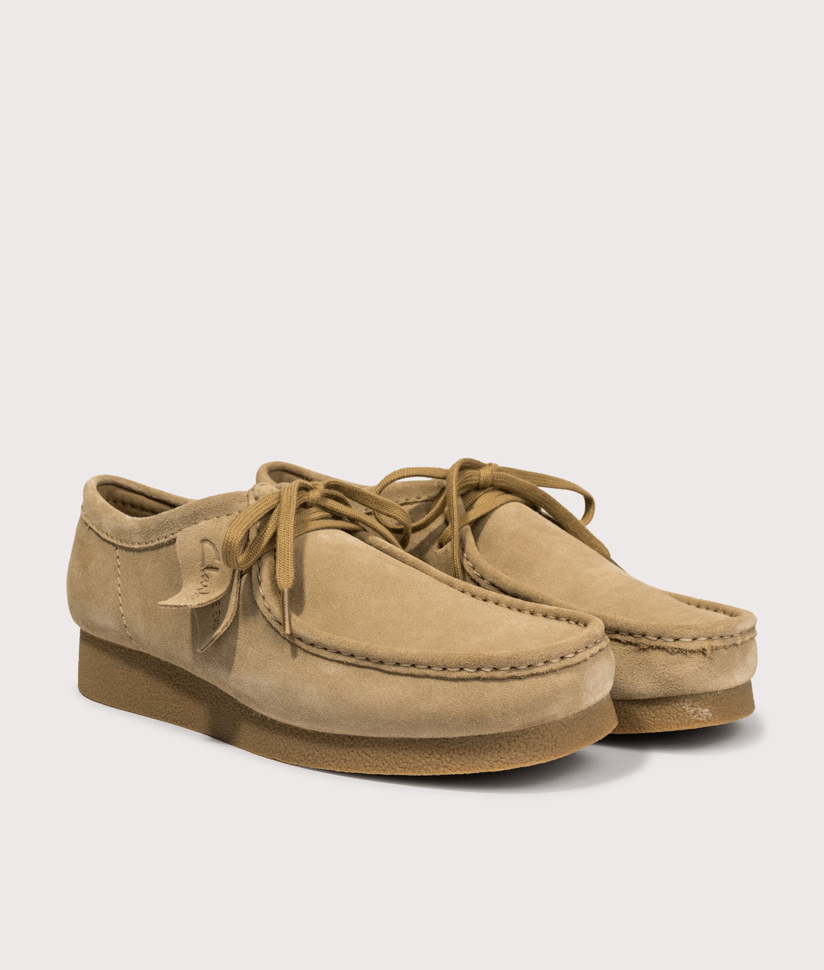 Clarks Originals Wallabee EVO in Dark Sand Suede at EQVVS Menswear. Angled front shot.