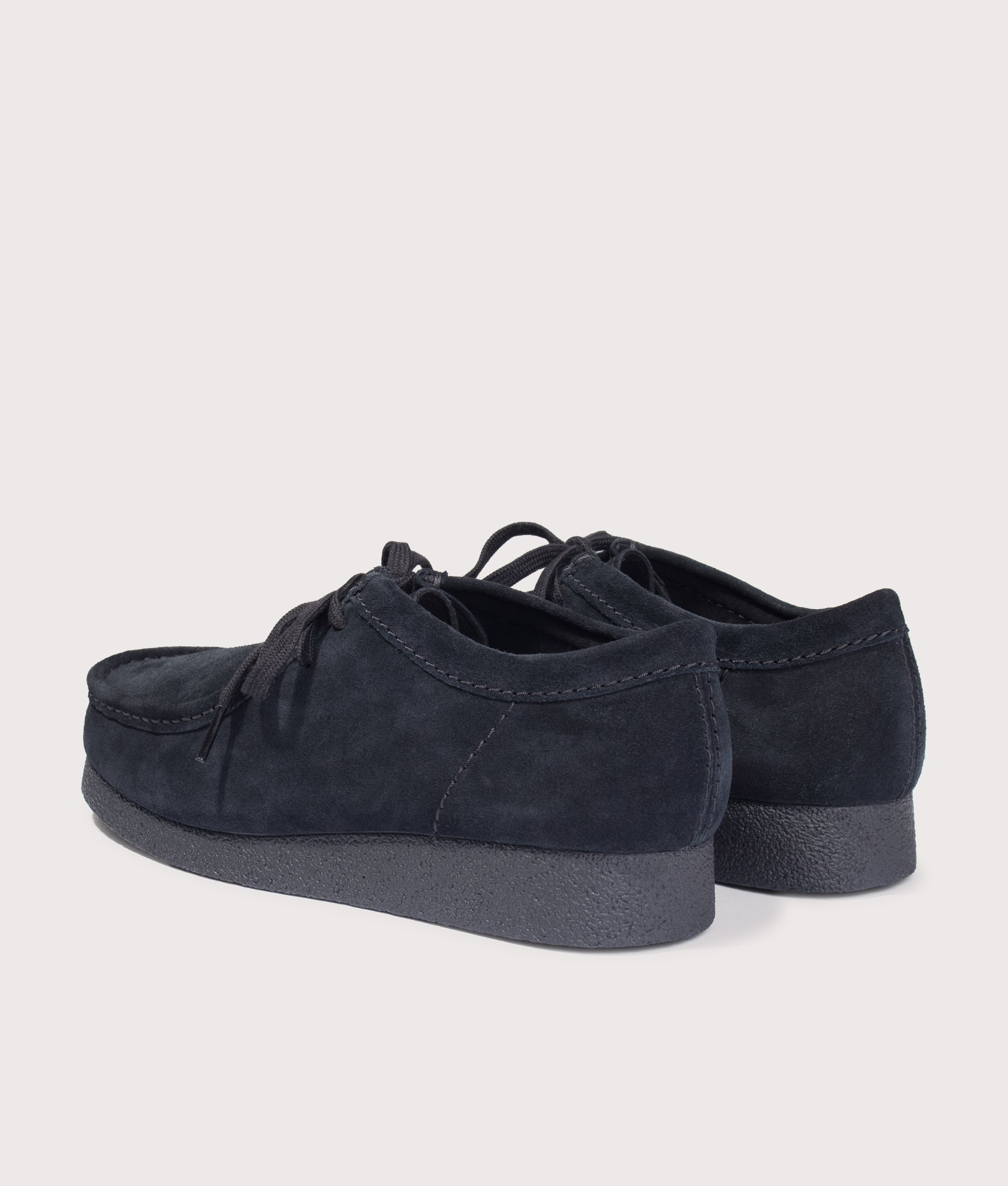 Clarks Originals Wallabee EVO in Dark Black Suede at EQVVS Menswear. Angled back shot.