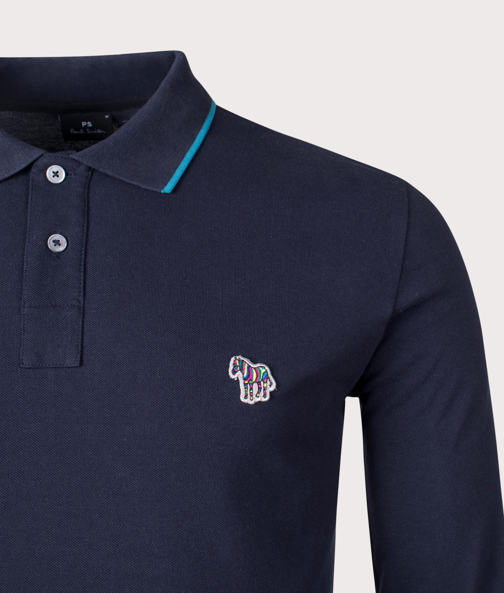 PS Paul Smith Long Sleeve Zebra Badge Polo Shirt in Navy Blue Angle Shot at EQVVS