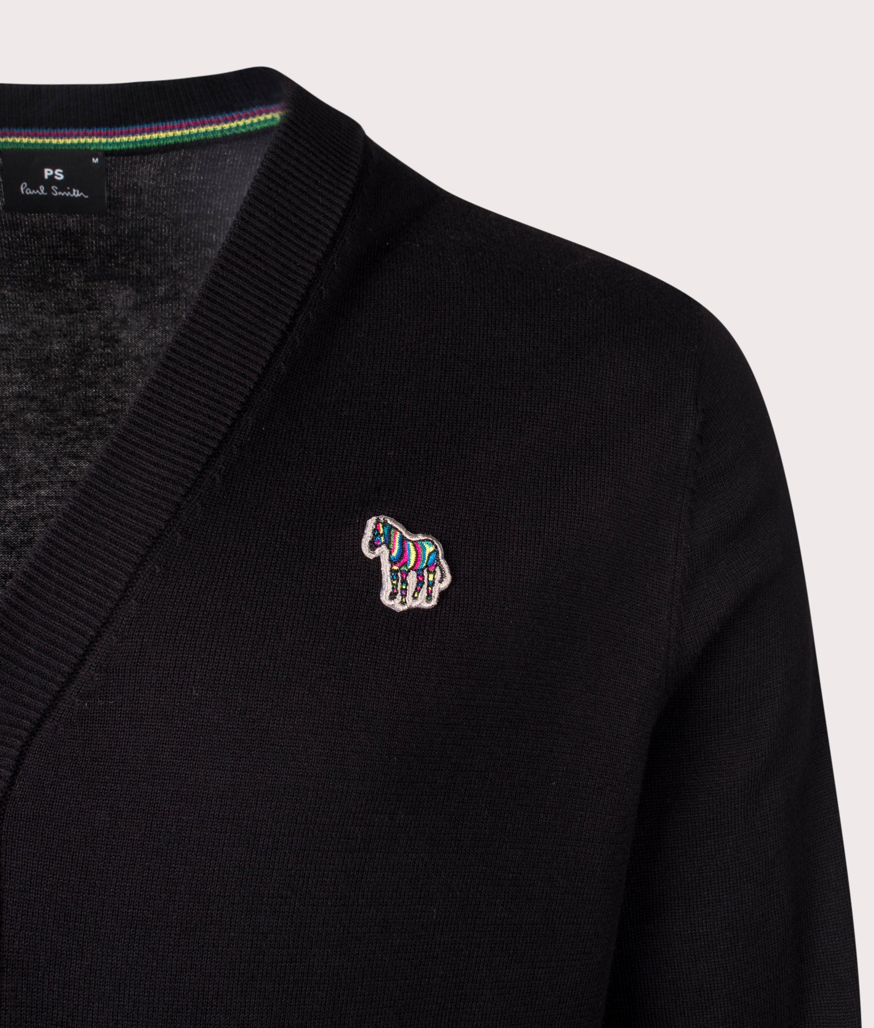 Paul Smith, Button Down Zebra Badge Cardigan in Black at EQVVS Menswear. Detail shot. 