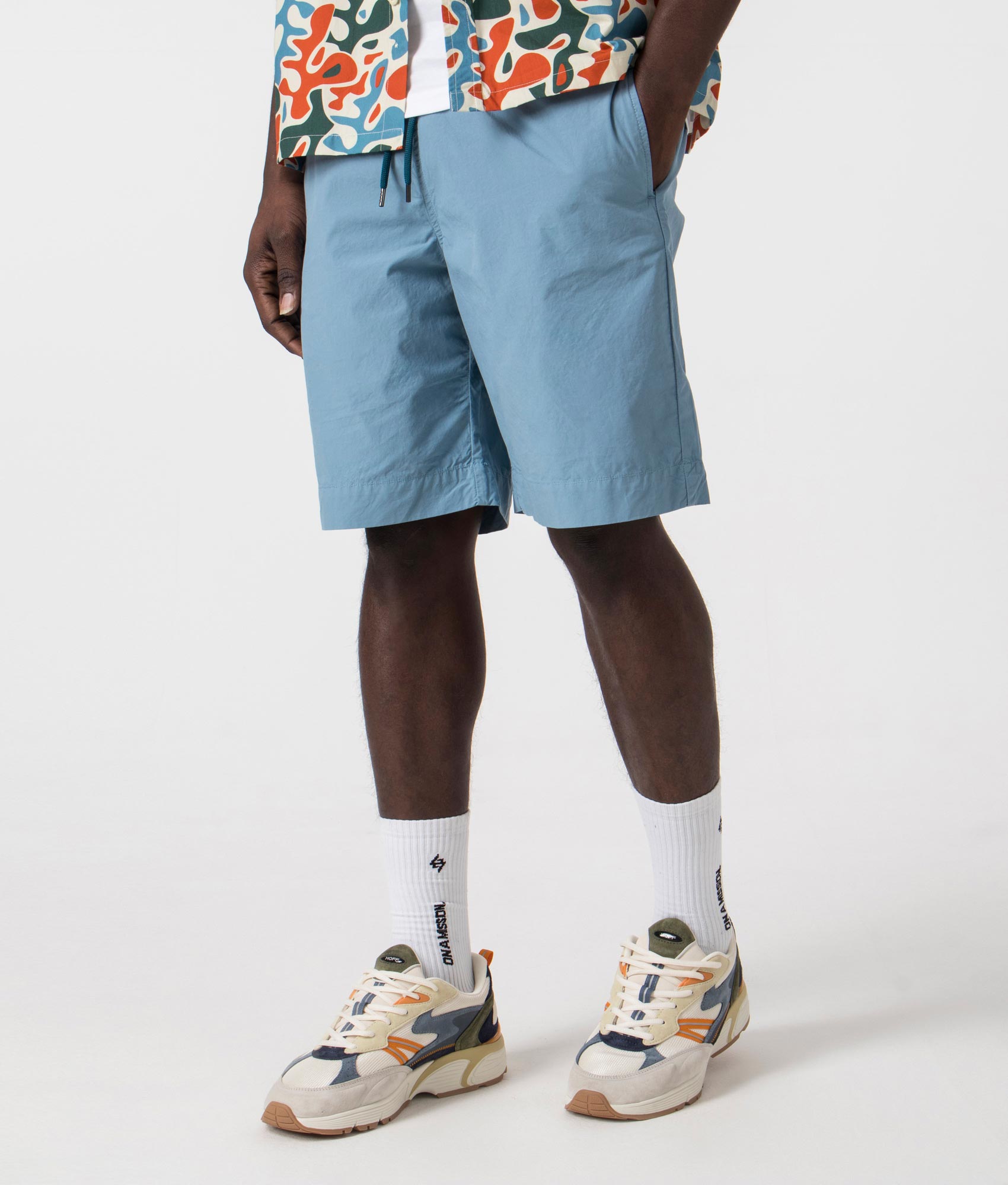 Drawstring Shorts in Greyish Blue by PS Paul Smith. EQVVS Side Angle Shot.