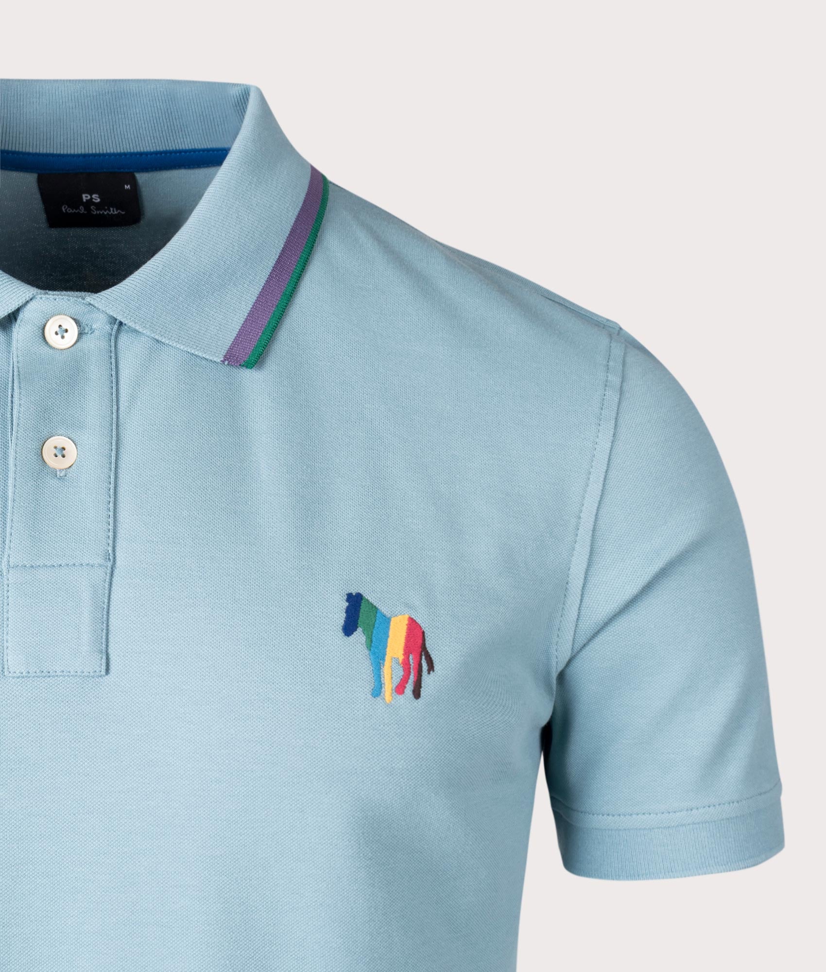 PS Paul Smith Zebra Emblem Polo Shirt in Cobalt Blue with Purple and Green Collar, 90% Cotton 55 Elastane Detail Shot at EQVVS