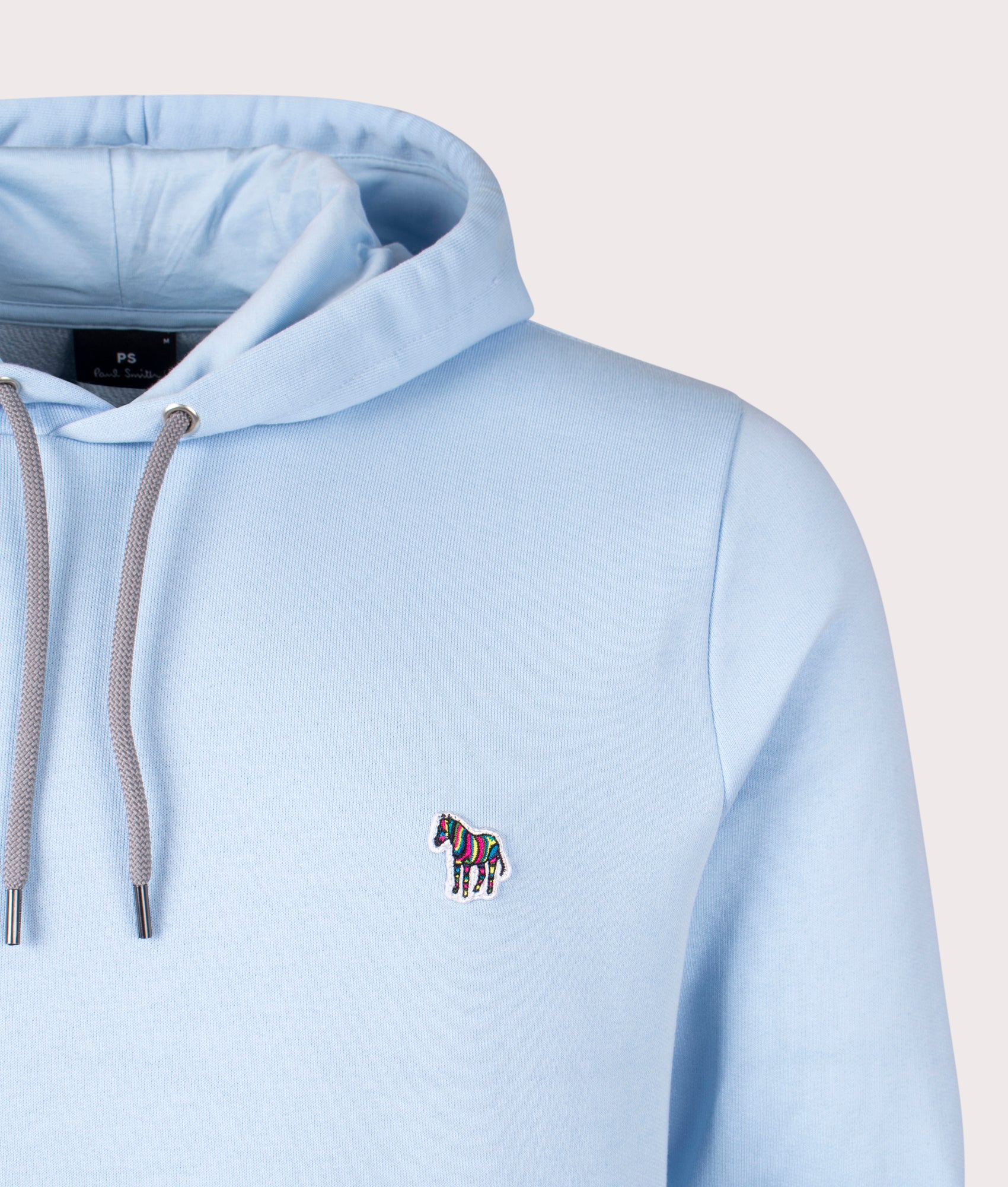PS Paul Smith Zebra Hoodie in Light Blue at EQVVS Menswear. Detail shot.