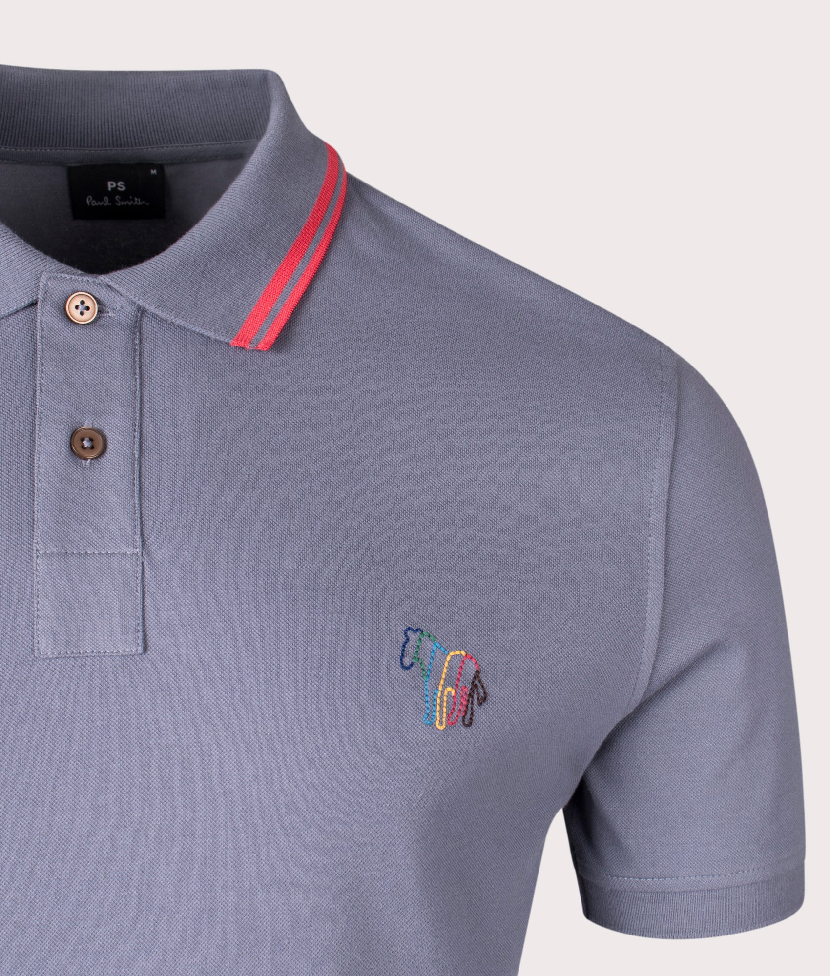 Zebra Emblem Polo Shirt in Slate by PS Paul Smith at EQVVS. Detail Shot.