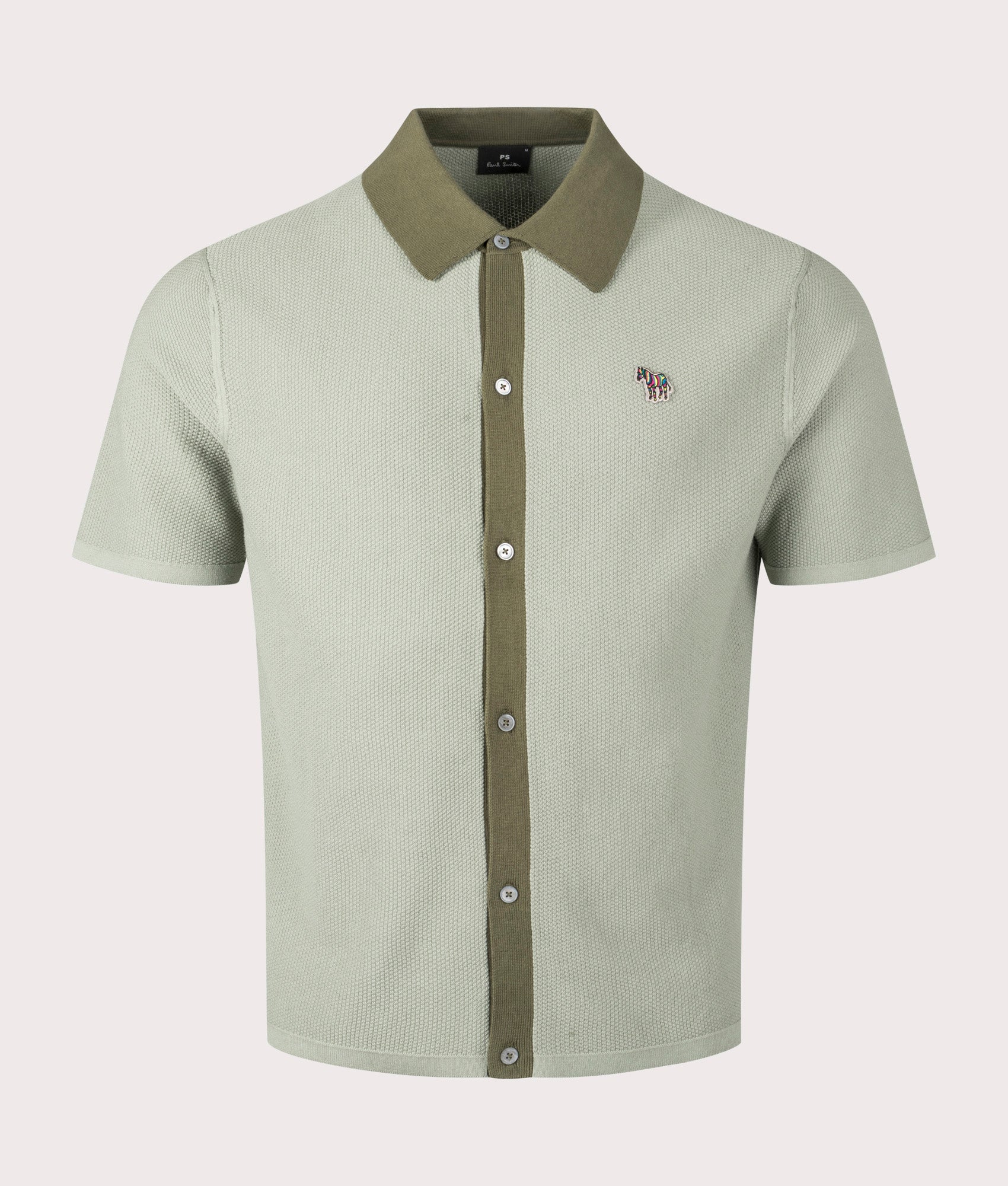 PS Paul Smith Zebra Badge Sweater Polo Shirt in green. EQVVS Front Shot.