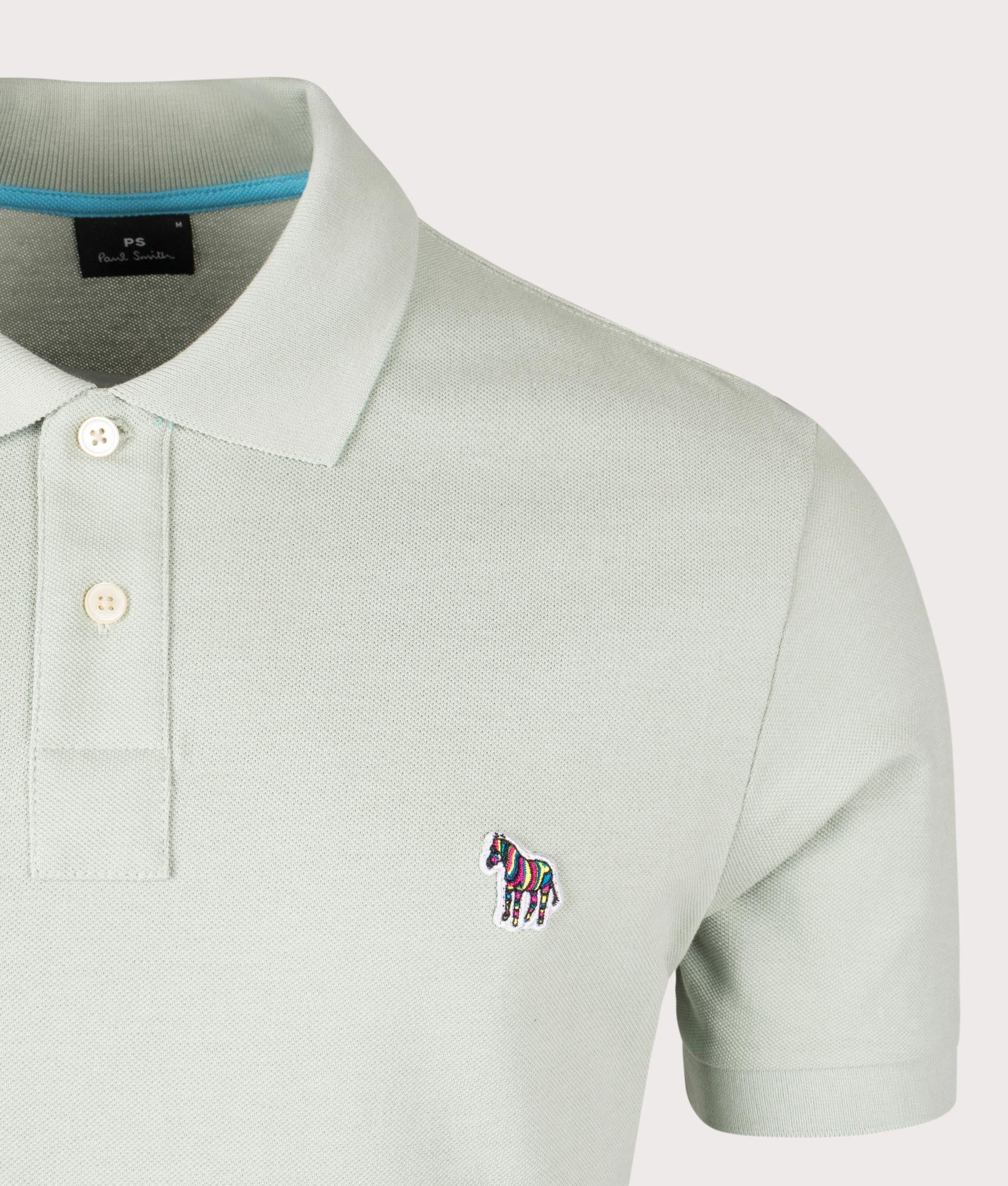 Zebra Polo Shirt in Pastel Green by PS Paul Smith. EQVVS Detail Shot.